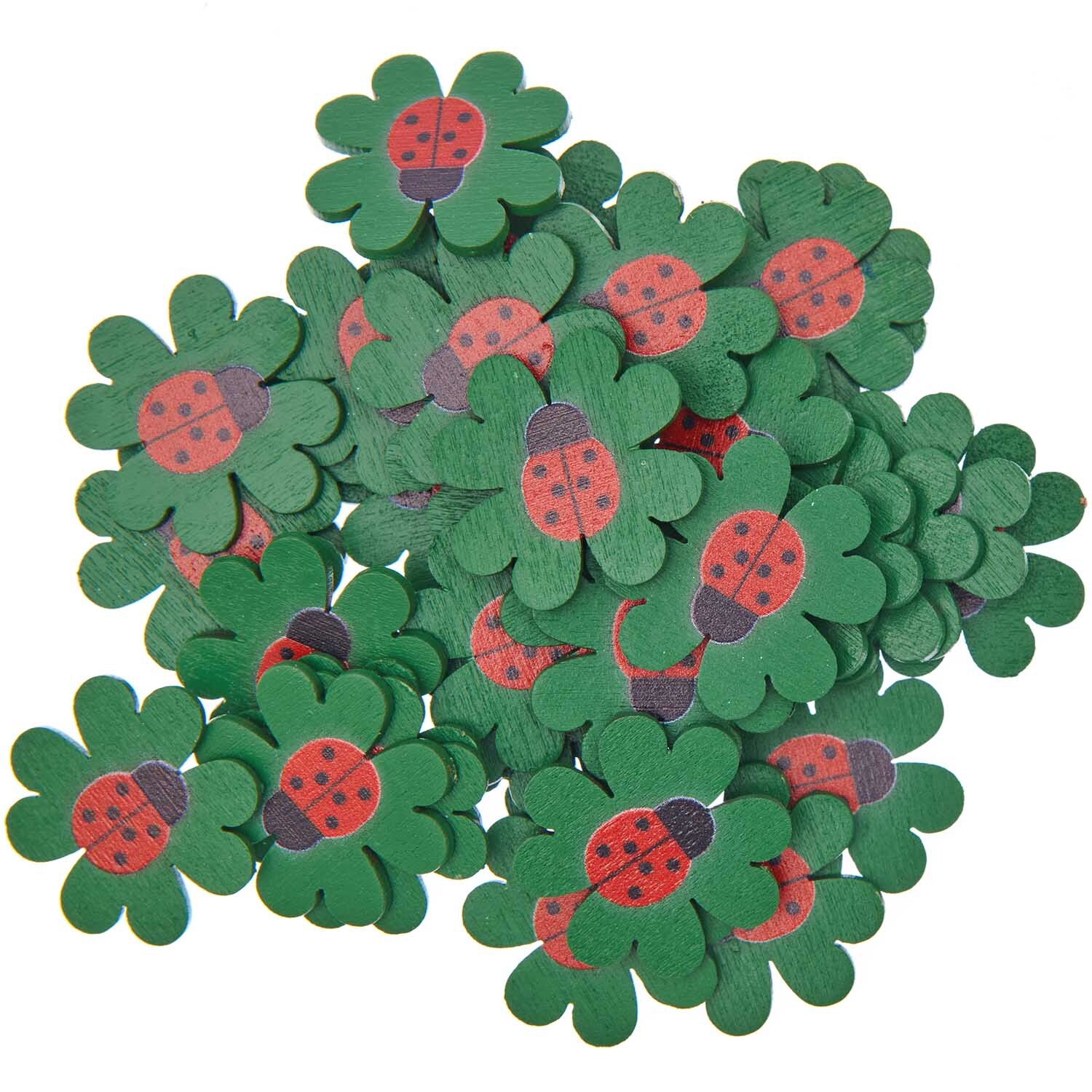 Streu Glücksklee 36 Stück von Rico Design: Grüne Kleeblätter mit Marienkäfer-Motiv, ideal für Dekorationen.