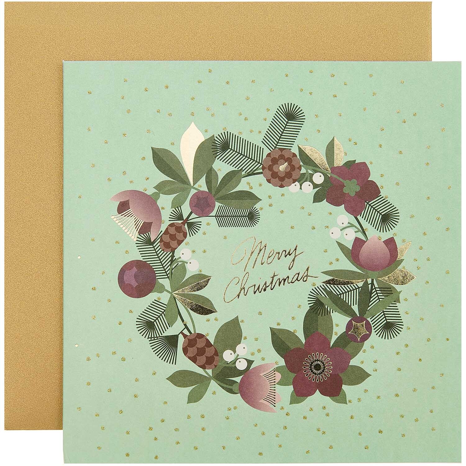 Paper Poetry Grußkarte Helleborus mit weihnachtlichem Kranzmotiv auf mintgrünem Hintergrund.