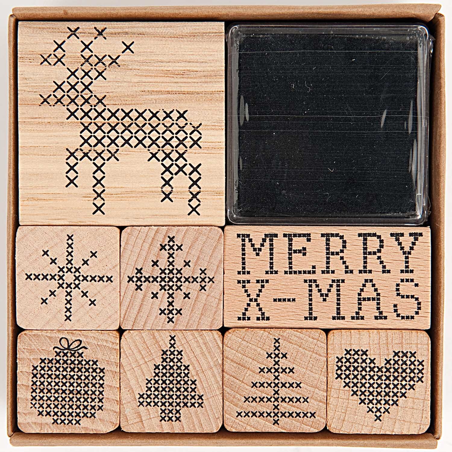 Paper Poetry Stempelset Weihnachten Kreuzstich mit 9 schwarzen Motiven, darunter Rentier, Schneeflocken und "Merry X-Mas", von Rico Design.