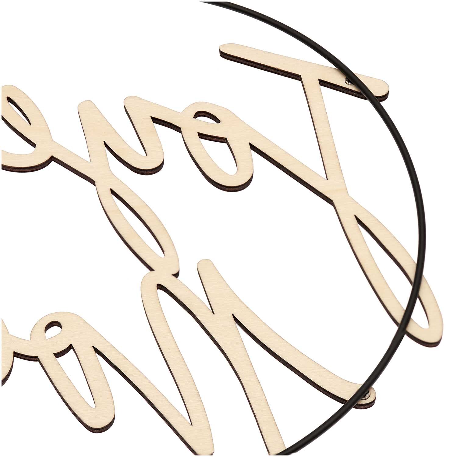 Holzschriftzug magnetisch "Joyeux Noël" 25,4x20,7cm von Rico Design Holzschriftzug magnetisch "Joyeux Noël" von Rico Design, dekorativ in einem schwarzen Metallring.