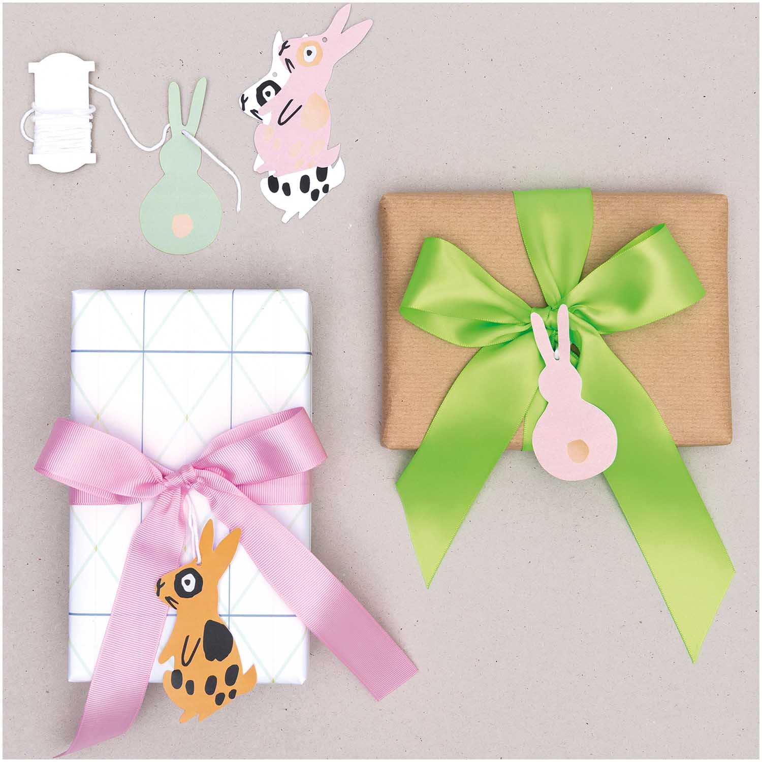 Paper Poetry Papieranhänger Bunny Hop Hasen 8 Stück von Rico Design Paper Poetry Papieranhänger Bunny Hop Hasen, dekorative Anhänger an Geschenken mit bunten Schleifen.