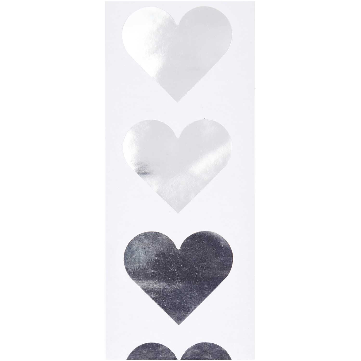 Paper Poetry Sticker Herzen 5cm 120 Stück auf der Rolle Hot Foil Farbe Silber von Rico Design Paper Poetry Sticker Herzen 5cm 120 Stück auf der Rolle Hot Foil. Silberne Herzsticker von Rico Design auf weißem Hintergrund.