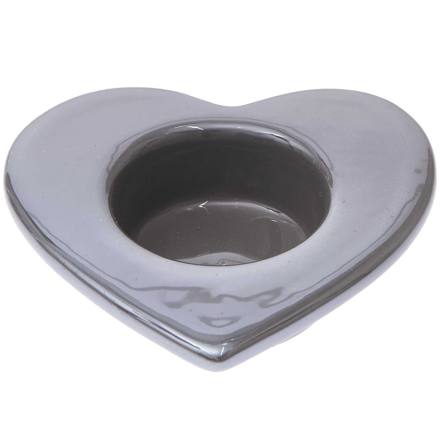 Keramik Teelichthalter Herz 9,7x9,4x2,8cm Farbe Grau von Rico Design Keramik Teelichthalter Herz in Grau von Rico Design, ideal für stimmungsvolle Dekorationen.