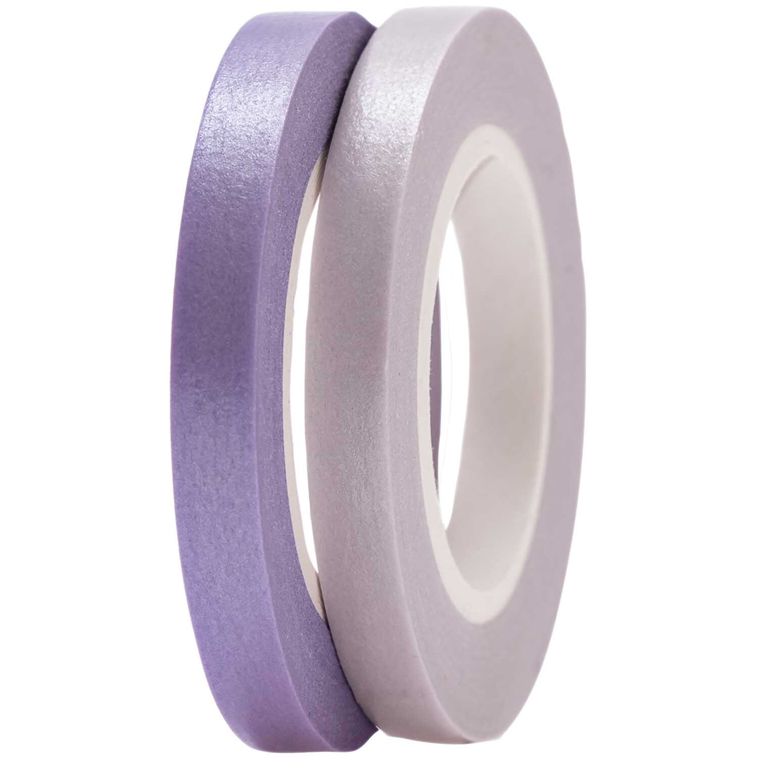 Paper Poetry Tapes uni 5mm 10m 2 Stück Farbe Flieder-Lila von Rico Design Paper Poetry Tapes uni 5mm 10m 2 Stück von Rico Design in Flieder-Lila, zwei Rollen Klebeband auf schwarzem Hintergrund.