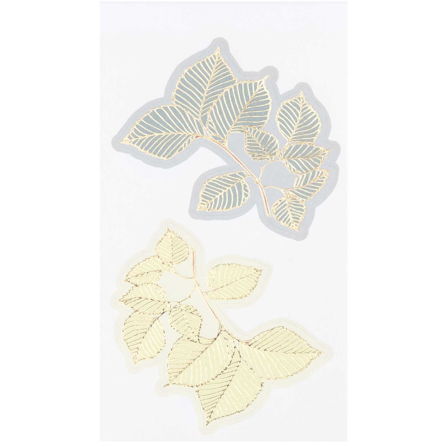 Paper Poetry Sticker Blüten 4 Blatt von Rico Design Paper Poetry Sticker Blüten 4 Blatt: Zwei filigrane Blättersticker in Gold auf hellem Hintergrund.