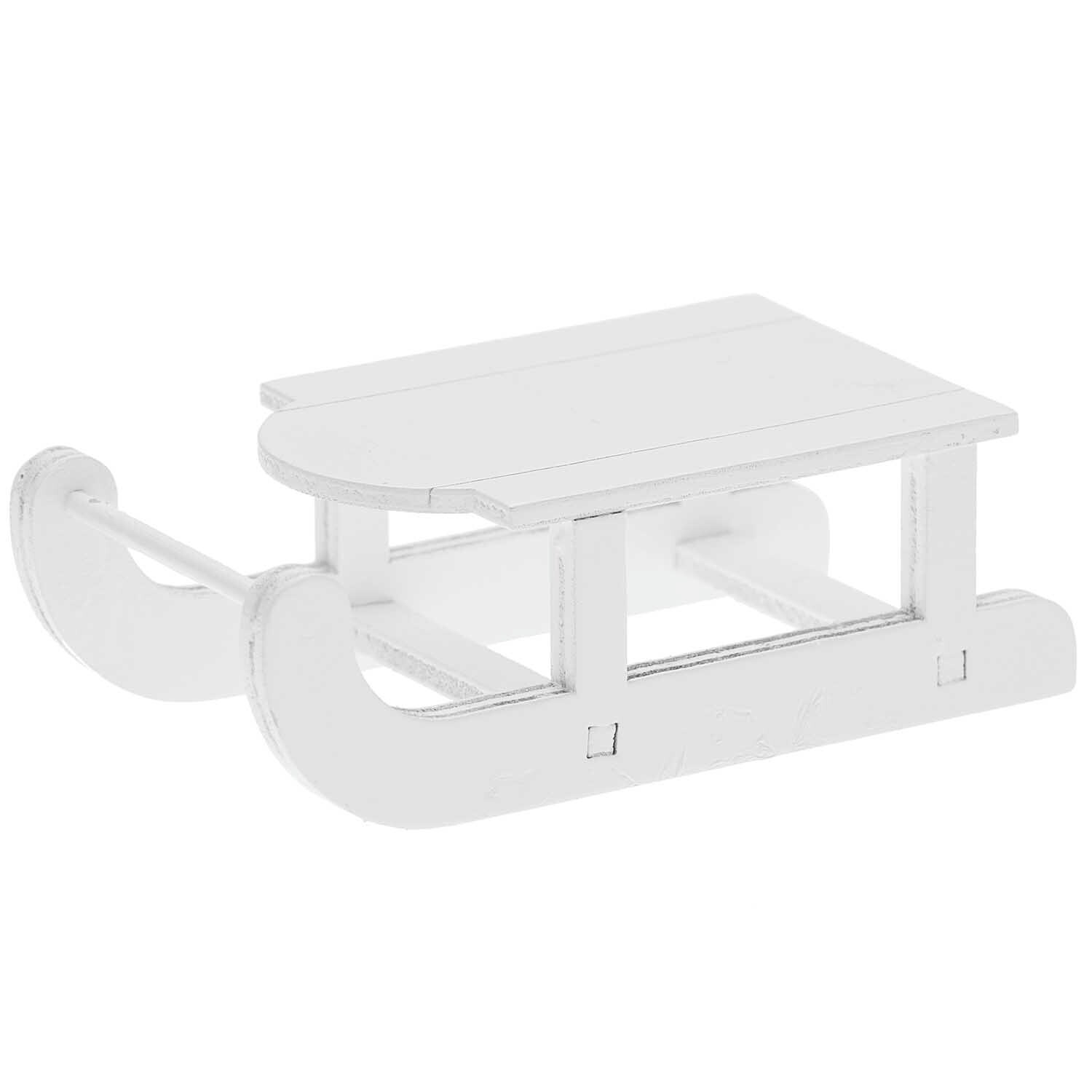 Miniatur Schlitten 7,5x4x2,5cm aus Holz, ideal für Dekorationen. Marke Rico Design.