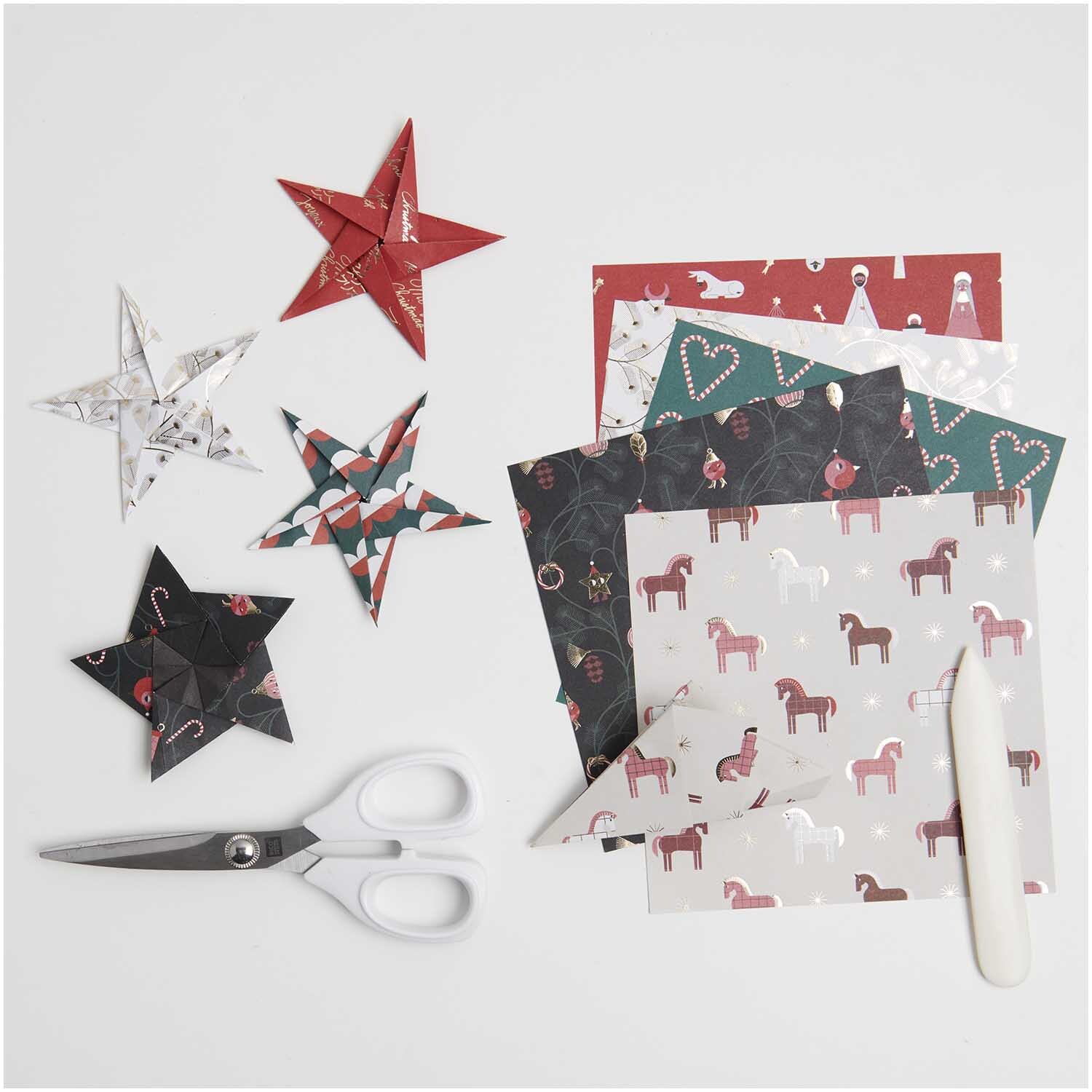 Paper Poetry Origami Christmas Rocks ! 15x15cm 50 feuilles from Rico Design Paper Poetry Origami Christmas Rocks! 15x15cm 50 Blatt zeigt bunte Origami-Sterne und festliche Papierbögen mit Schere und Falzbein.
