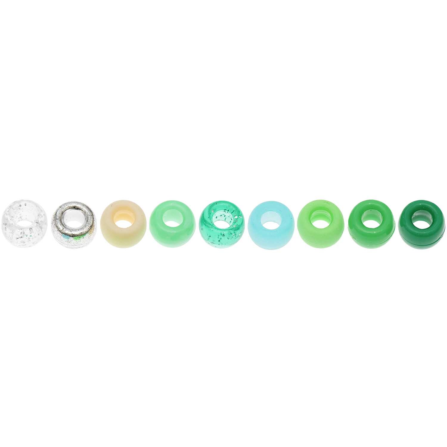 Itoshii - Ponii Beads in verschiedenen Grüntönen, 9x6mm, 80 Stück, von Rico Design, aufgereiht.