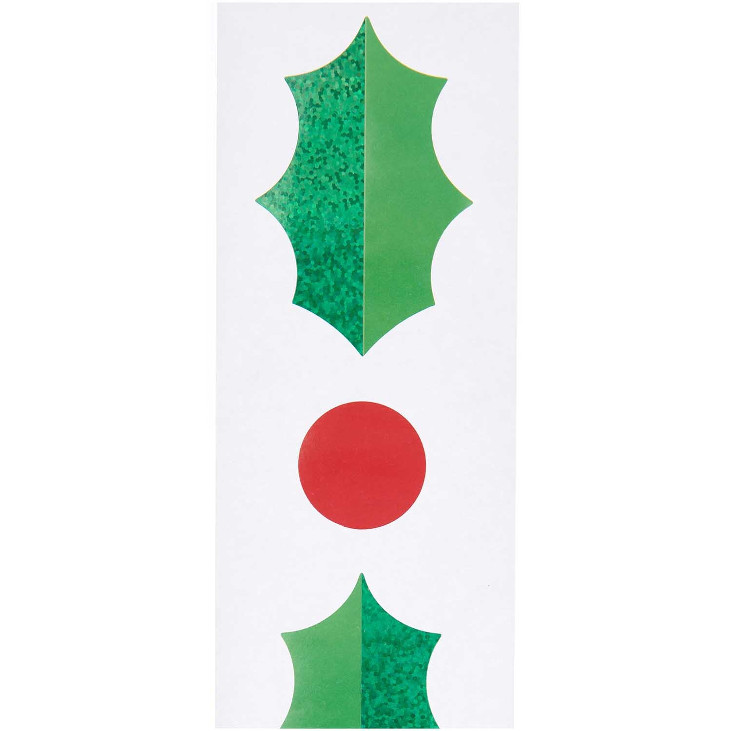 Paper Poetry Sticker Ilex zeigt grüne Stechpalmenblätter und rote Beeren auf weißem Hintergrund. Ideal für festliche Dekorationen.