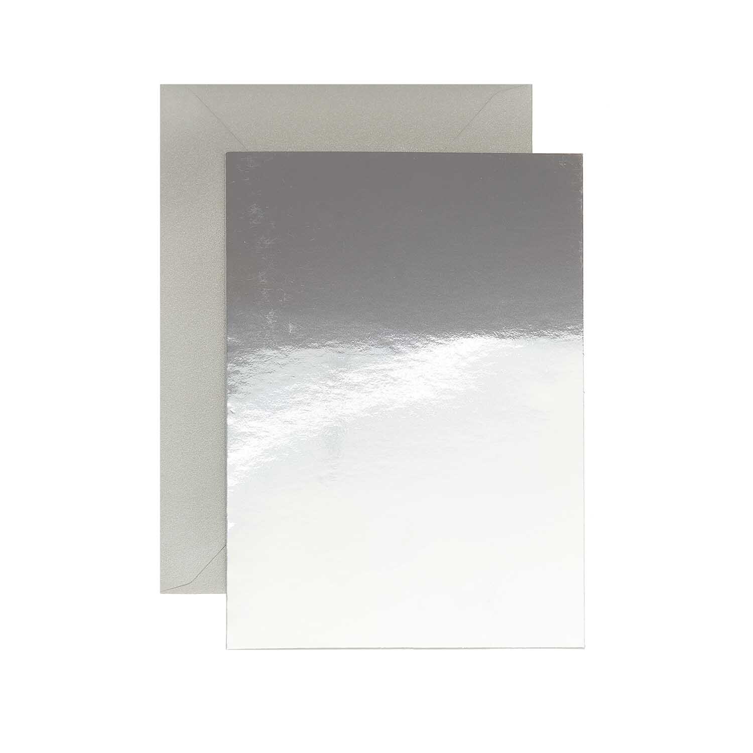 Paper Poetry Kartenset mit silbernem Spiegelkarton von Rico Design, bestehend aus 20 Teilen, zeigt glänzende Oberfläche und Umschläge in A7/C7-Format.