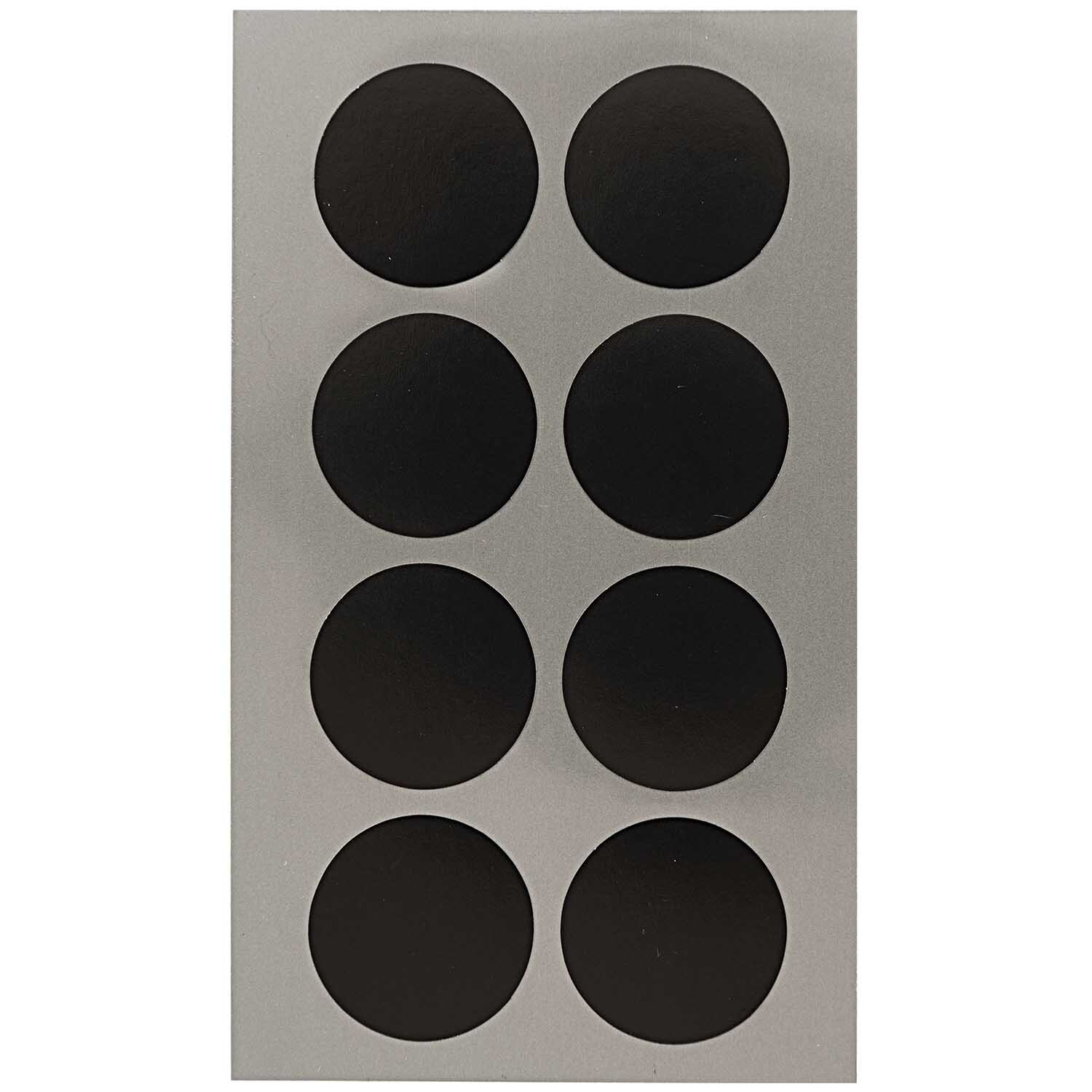 Office Sticker Punkte 25mm 4 Bogen: Acht schwarze Punkte auf einem Bogen von Rico Design für Büroanwendungen.