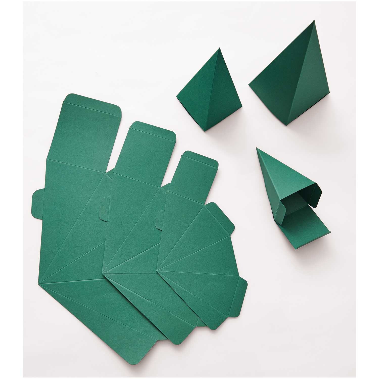 Paper Poetry Adventskalender Bäume 24 Stück Farbe Grün von Rico Design Paper Poetry Adventskalender Bäume 24 Stück: Grüne Papierbögen und gefaltete Baumformen von Rico Design.