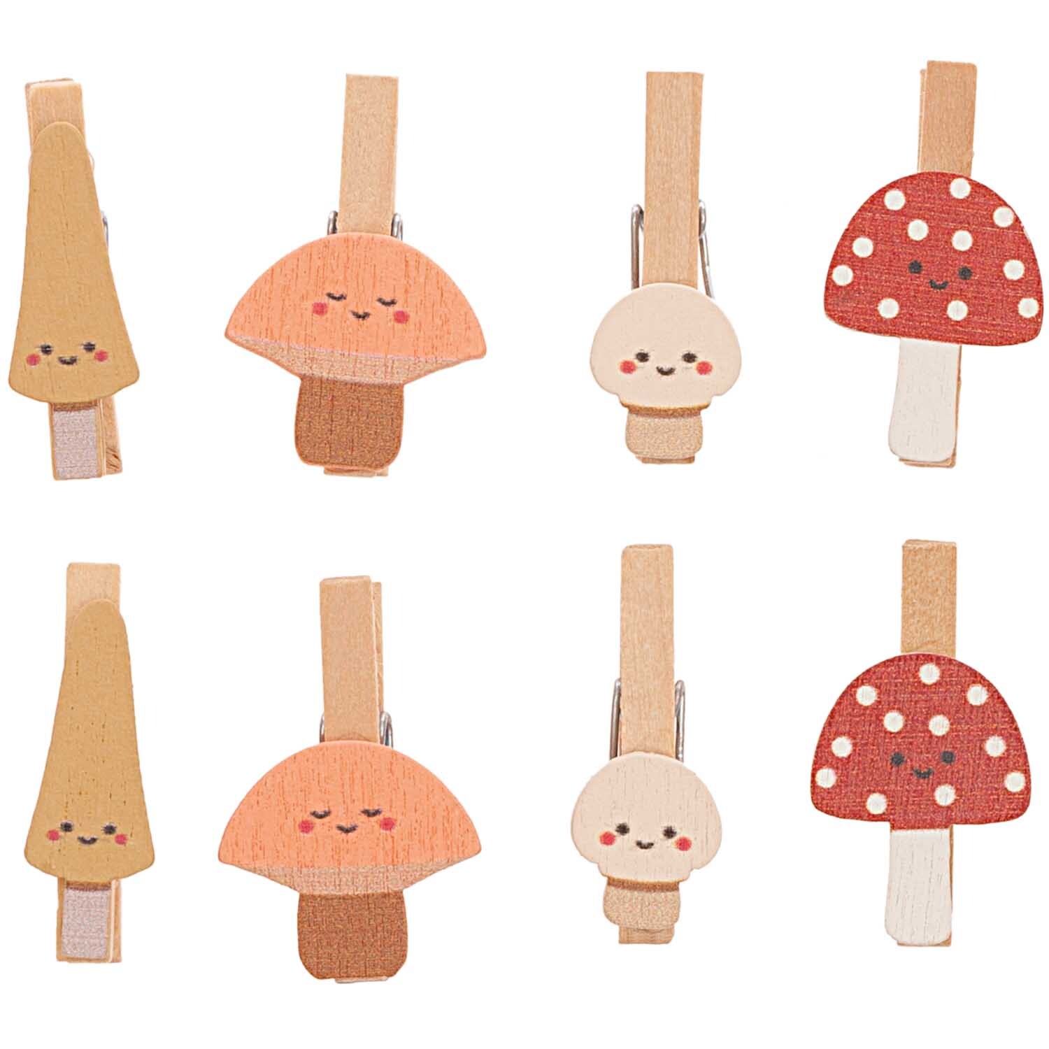 Holzclips Pilze Mix: Acht bunte Holzklammern in Pilzform mit fröhlichen Gesichtern von Rico Design.