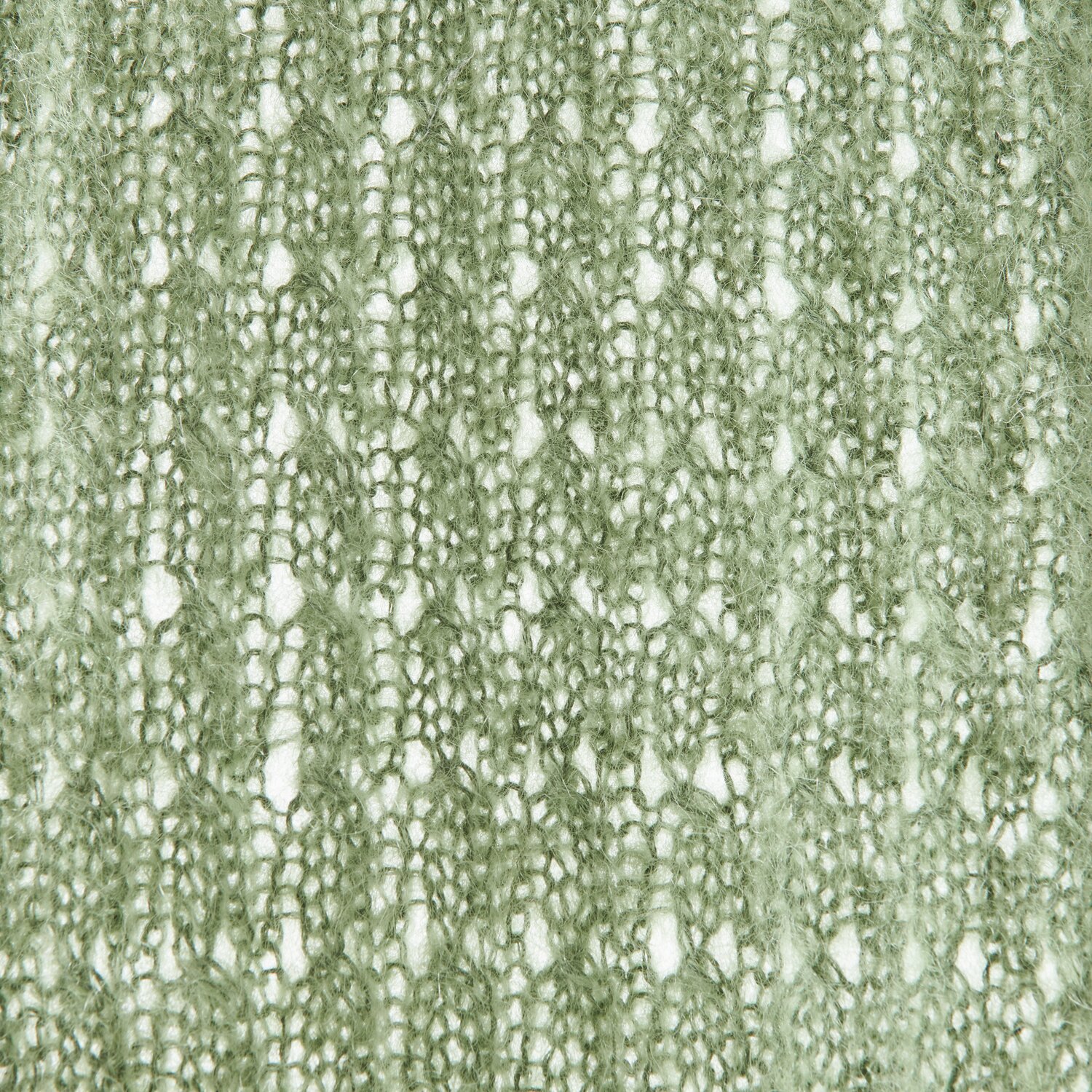 Luxury Alpaca Cotton Fusion 50g 190m Farbe Aloe von Rico Design Ein gestricktes Textilmuster in zartem Grün, das die feine Struktur und das Design des Stoffes zeigt. Ideal für Modeprojekte, die Eleganz und Stil betonen.