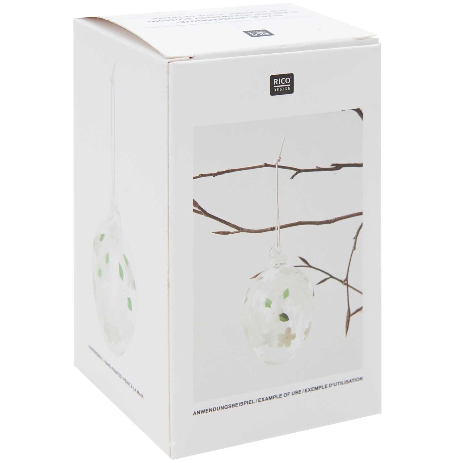 Glas Ei Erdbeerblüte handbemalt Ø 6cm von Rico Design Glas Ei Erdbeerblüte handbemalt Ø 6cm von Rico Design, präsentiert in einer weißen Verpackung mit Astmotiv.