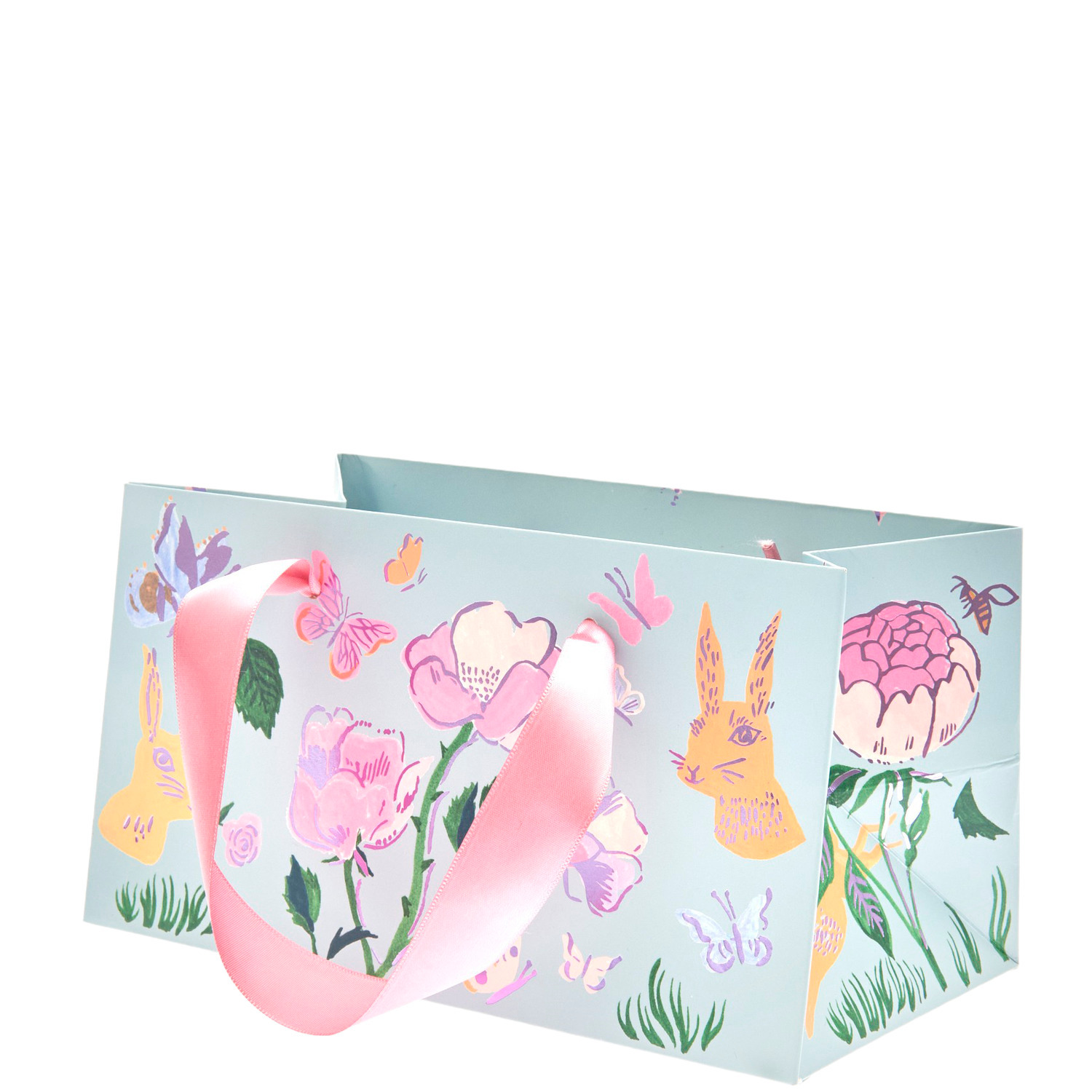 Geschenktüte Frühlingswiese Aquarell mit bunten Blumen und Hasenmotiven, rosa Griffen, von Rico Design.