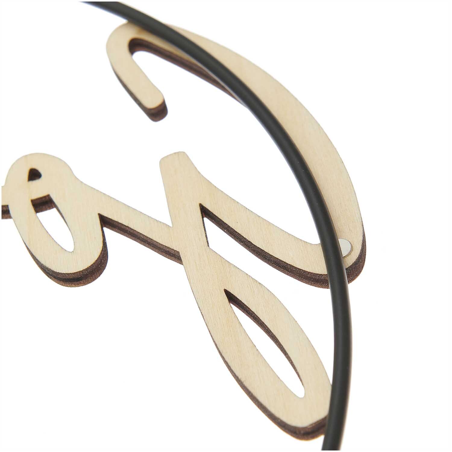 Holzschriftzug magnetisch "Good Vibes" 26x13cm von Rico Design Holzschriftzug "Good Vibes" von Rico Design, magnetisch, zeigt elegante Buchstaben auf hellem Holz.
