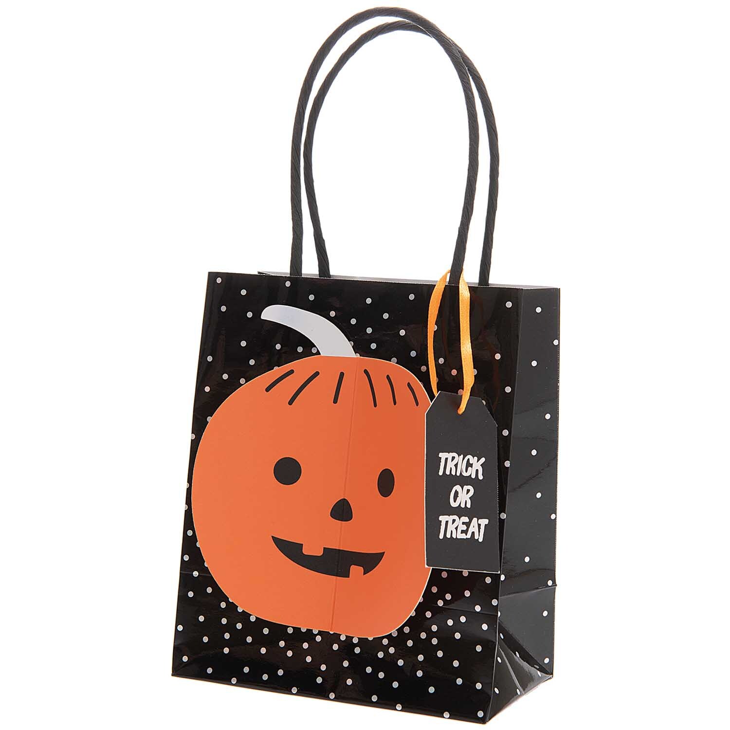 Paper Poetry Papiertüte klein Kürbis mit Kürbisdesign und "Trick or Treat"-Anhänger, ideal für Halloween.