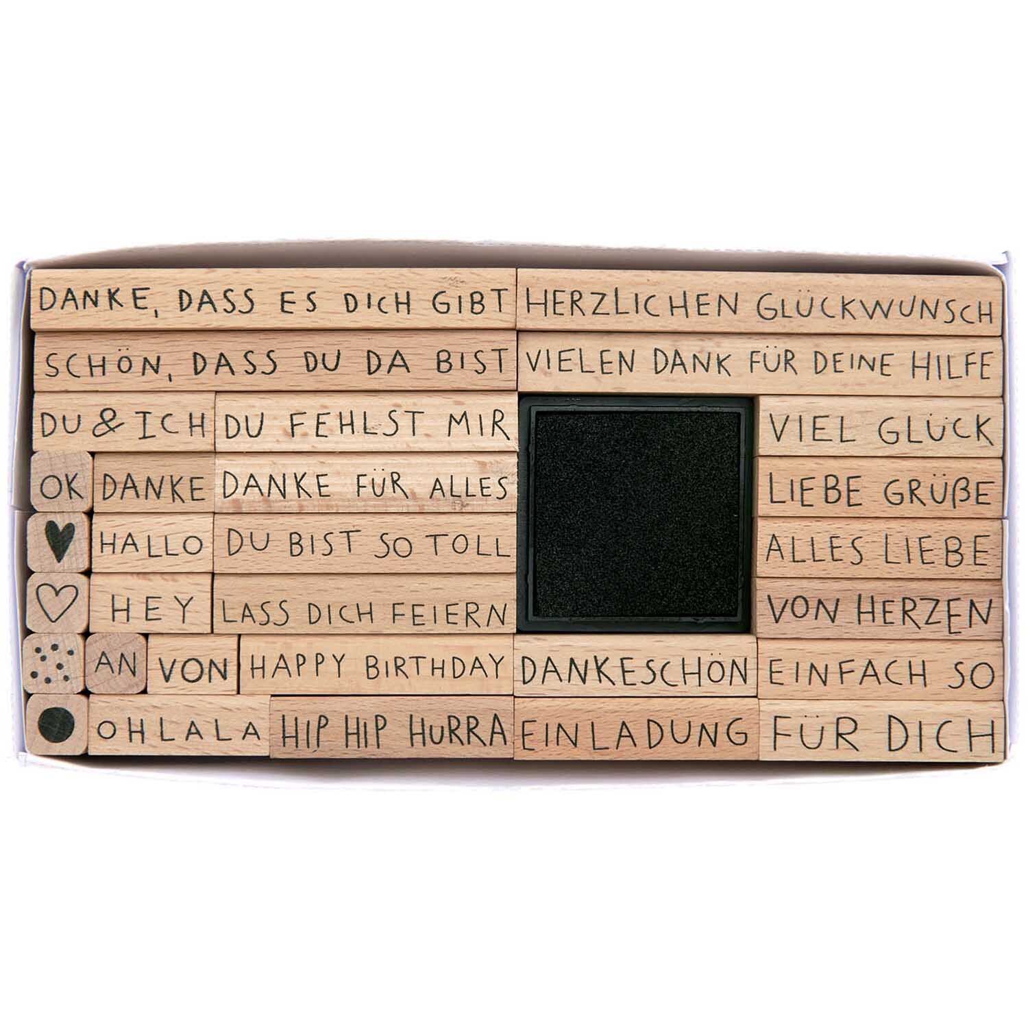 Paper Poetry Stempelset Texte Deutsch XL, 31-teilig. Verschiedene Stempel mit deutschen Texten und Symbolen, ideal für kreative Projekte.