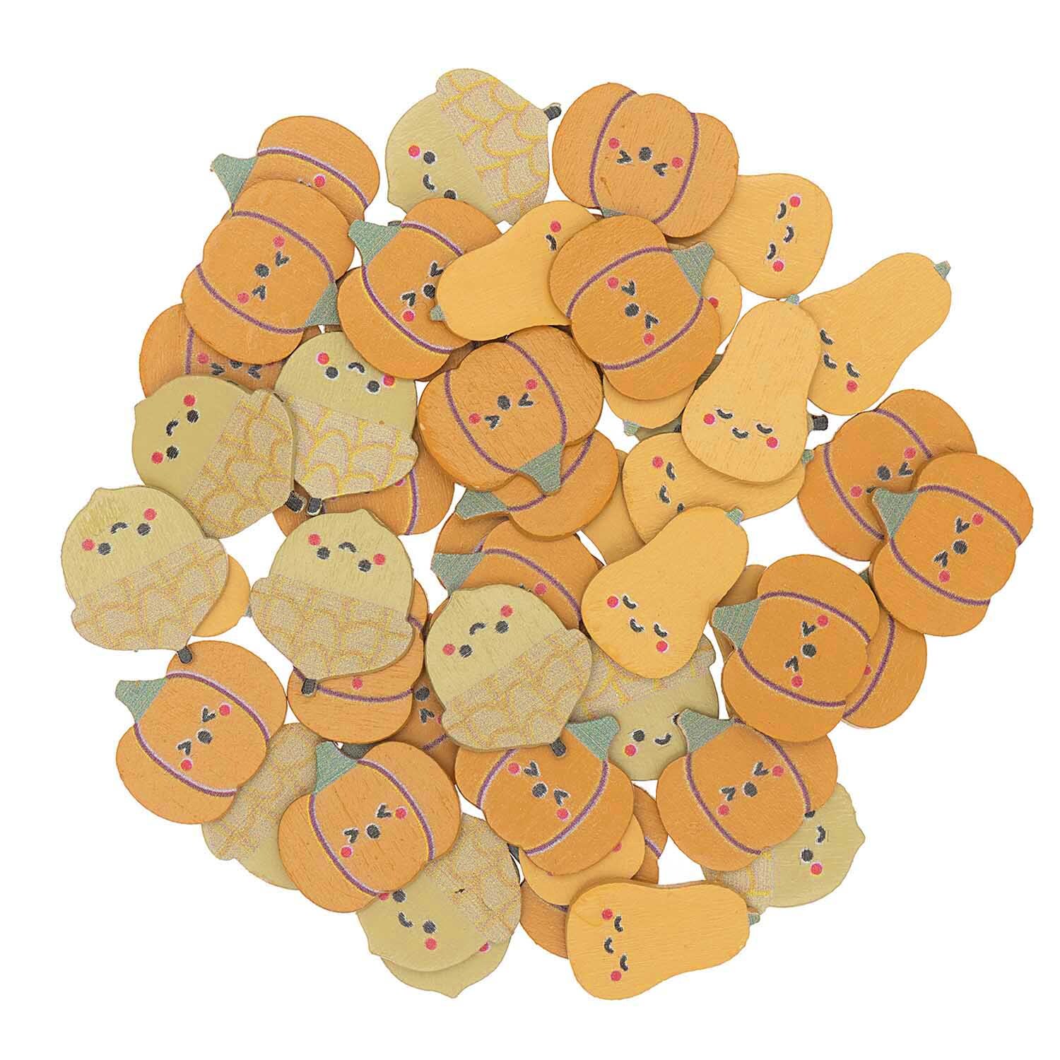 Holzstreu Kürbis Mix bunt 48 Stück von Rico Design zeigt fröhliche Kürbis- und Birnenmotive in verschiedenen Gelbtönen.