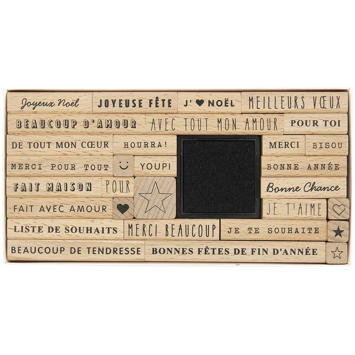 Paper Poetry XL Stempelset mit französischen Texten, 31-teilig, von Rico Design, auf Holz.