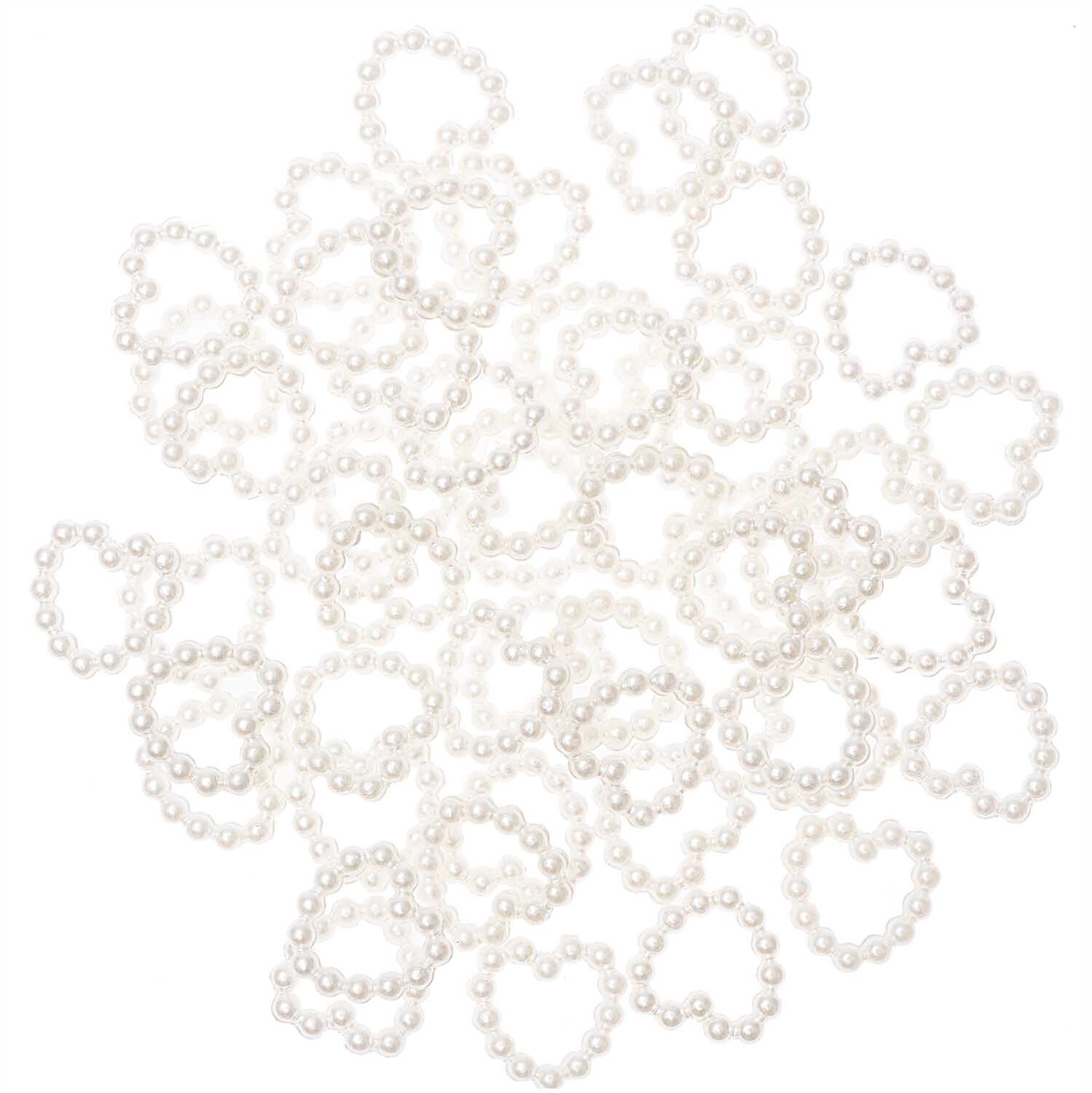 Perlenstreu Herz klein perlmutt 50 Stück von Rico Design. Herzförmige Perlen in Perlmuttoptik, ideal für Dekorationen und Bastelprojekte.