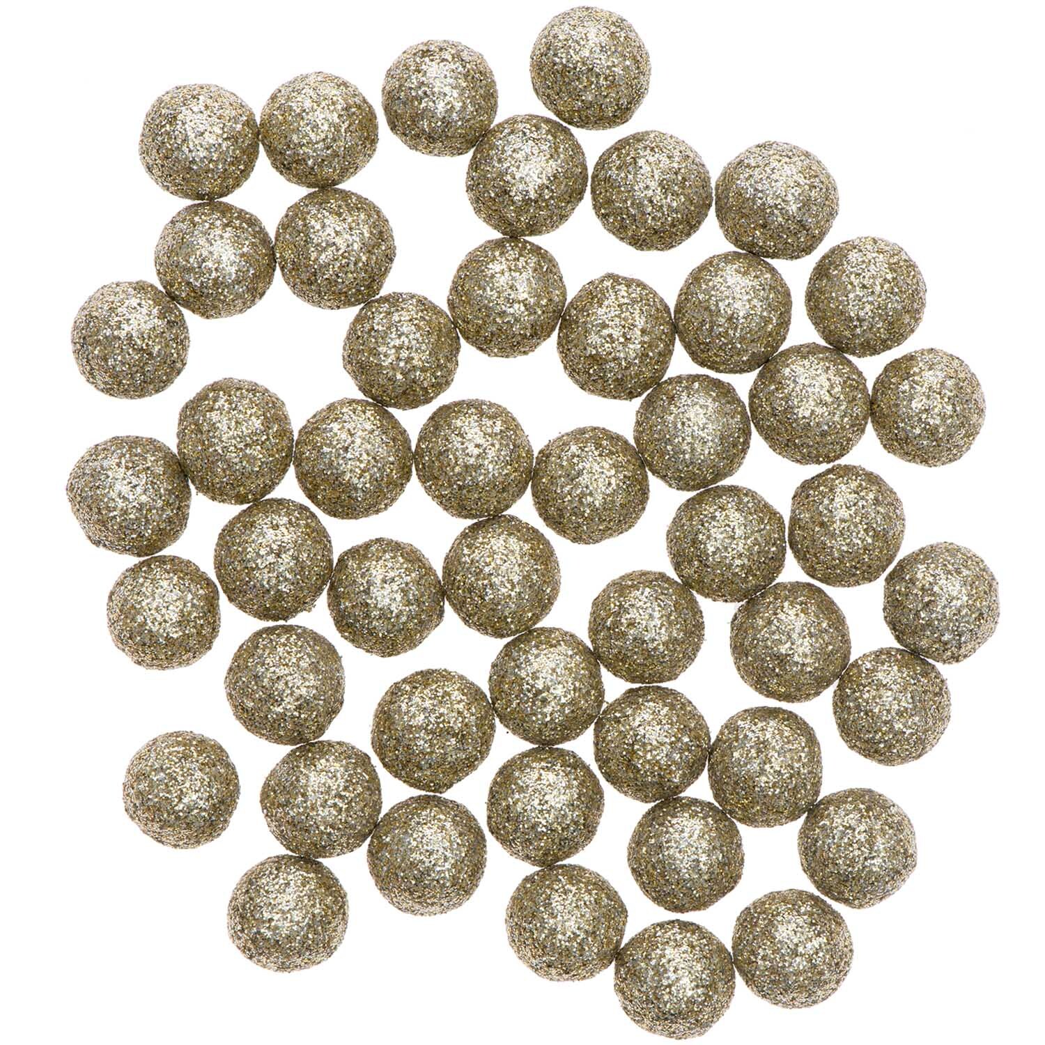 Glitterkugeln gold von Rico Design: Eine Ansammlung goldener, glitzernder Kugeln auf schwarzem Hintergrund.