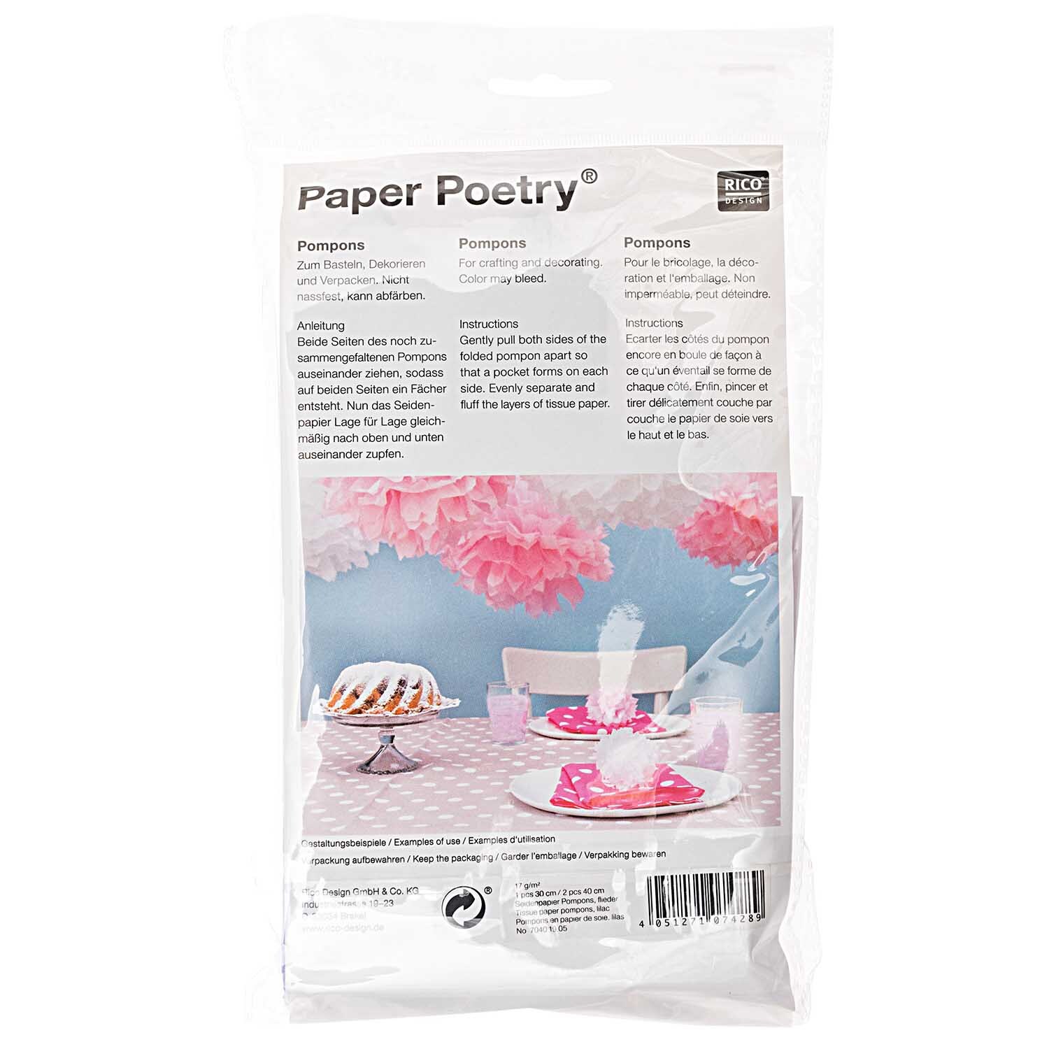 Seidenpapier Pompons 17g/m² 3 Stück in Flieder von Rico Design, dekorativ arrangiert über einem Tisch mit Kuchen und Geschirr.