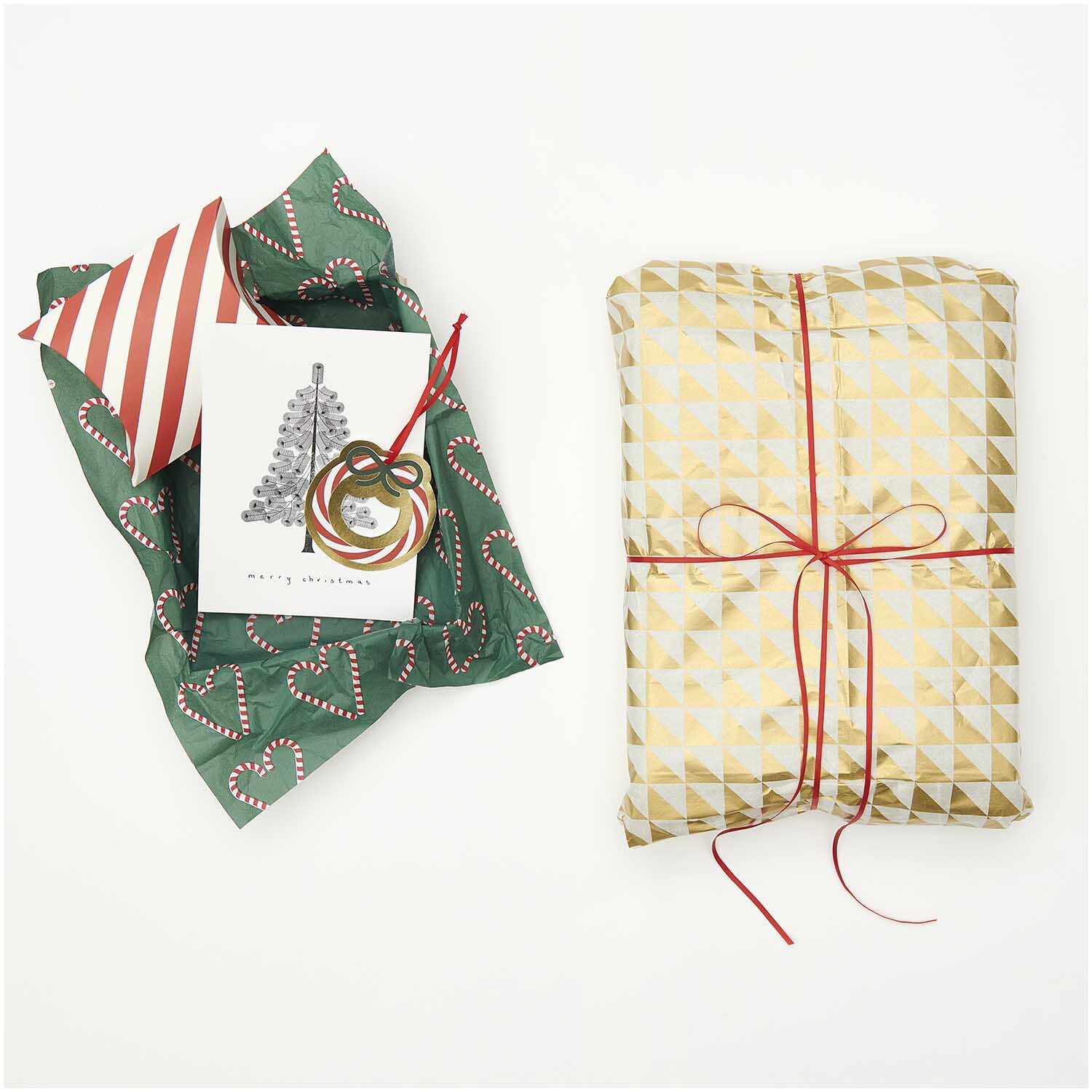 Paper Poetry Seidenpapier Zuckerstangen Herzen 50x70cm von Rico Design Paper Poetry Seidenpapier zeigt ein Geschenk in grünem Papier mit Zuckerstangenherzen von Rico Design.
