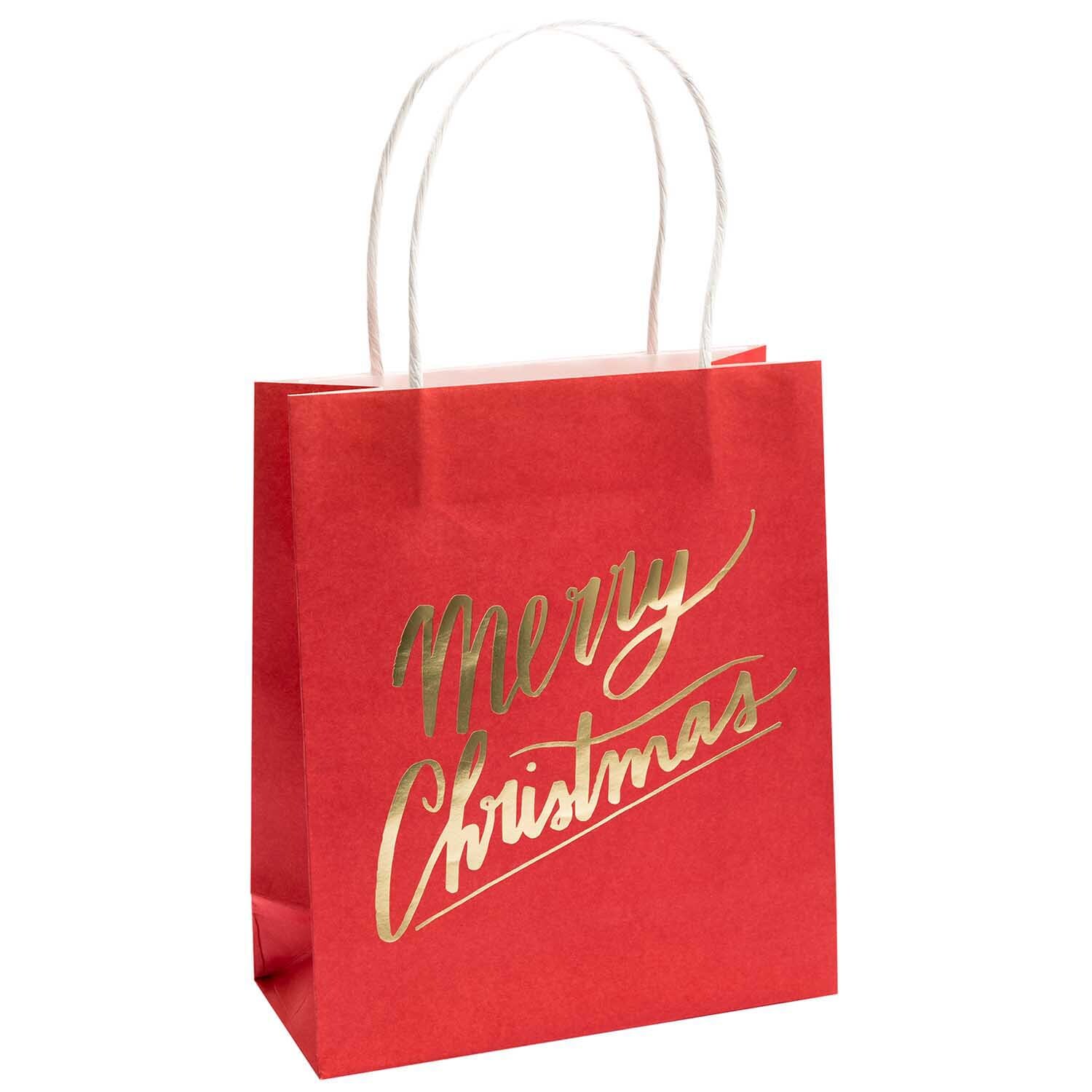 Paper Poetry Papiertüten Merry Christmas rot 18x21cm 2 Stück von Rico Design Paper Poetry Papiertüten Merry Christmas in Rot mit goldener Schrift und weißen Griffen, 18x21cm, 2 Stück von Rico Design.