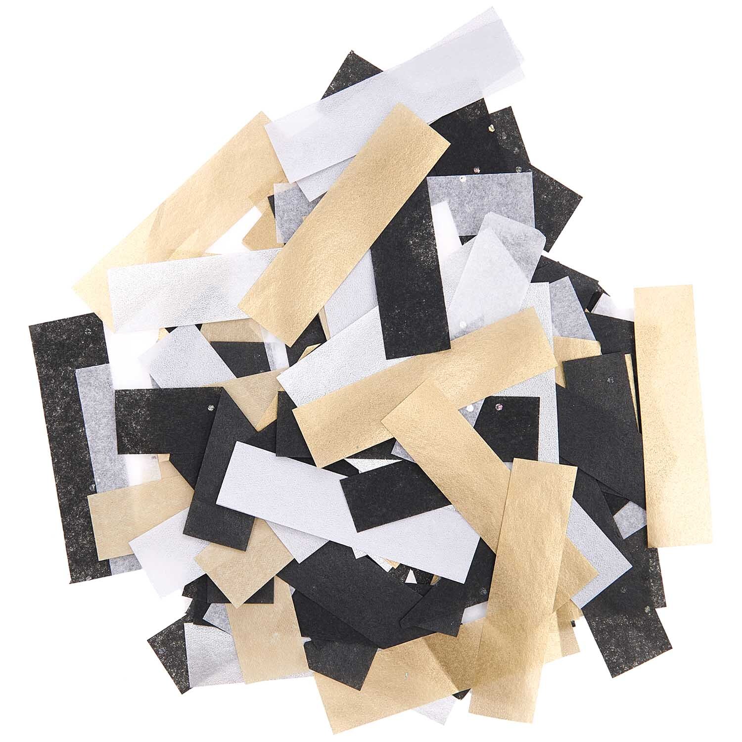 Konfetti Glitzer Mix classic 20g von Rico Design: Rechteckige Papierstücke in Schwarz, Weiß und Gold. Ideal für festliche Dekorationen und Bastelprojekte.