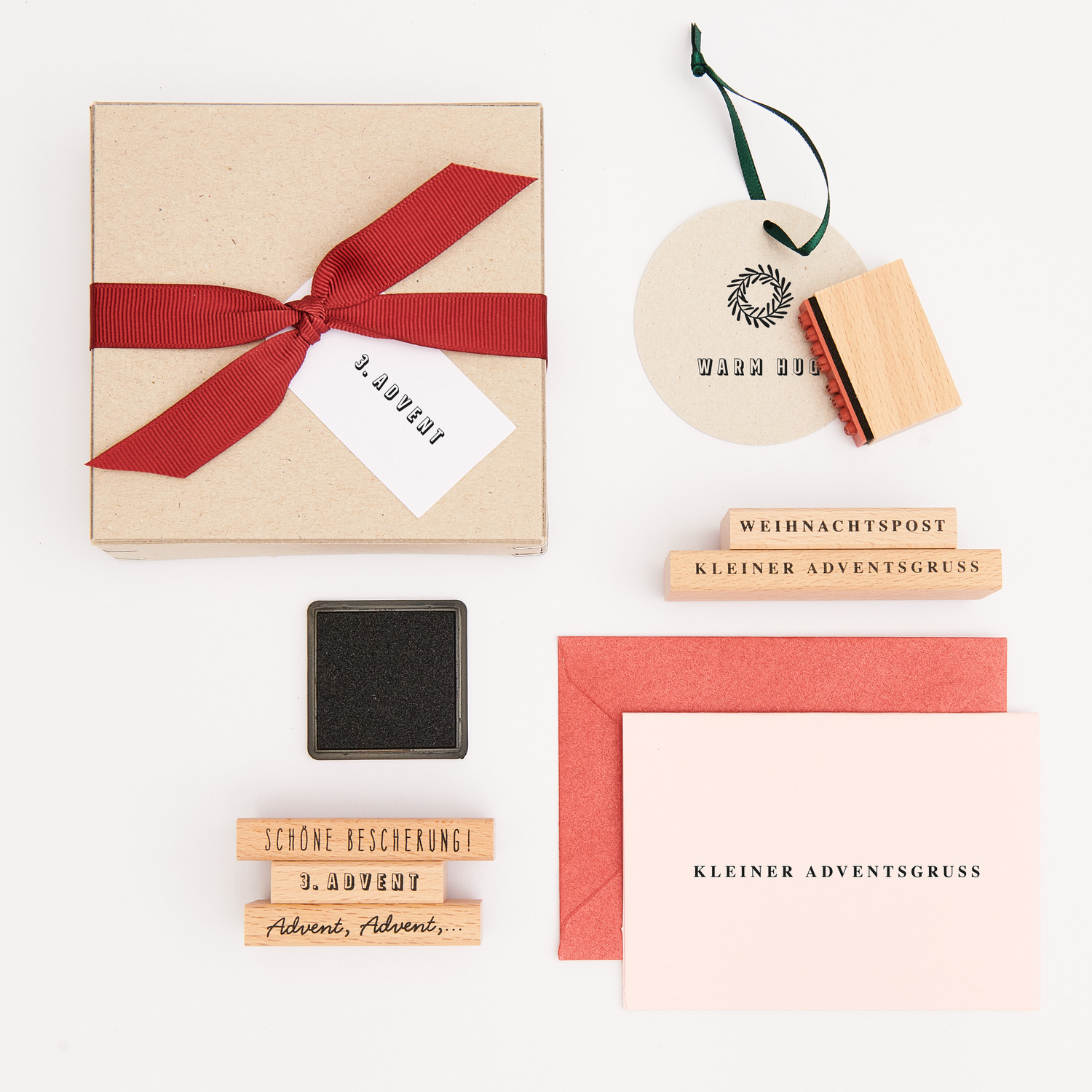 Paper Poetry Stempelset für den Advent, 25-teilig, mit roten und naturfarbenen Elementen von Rico Design.