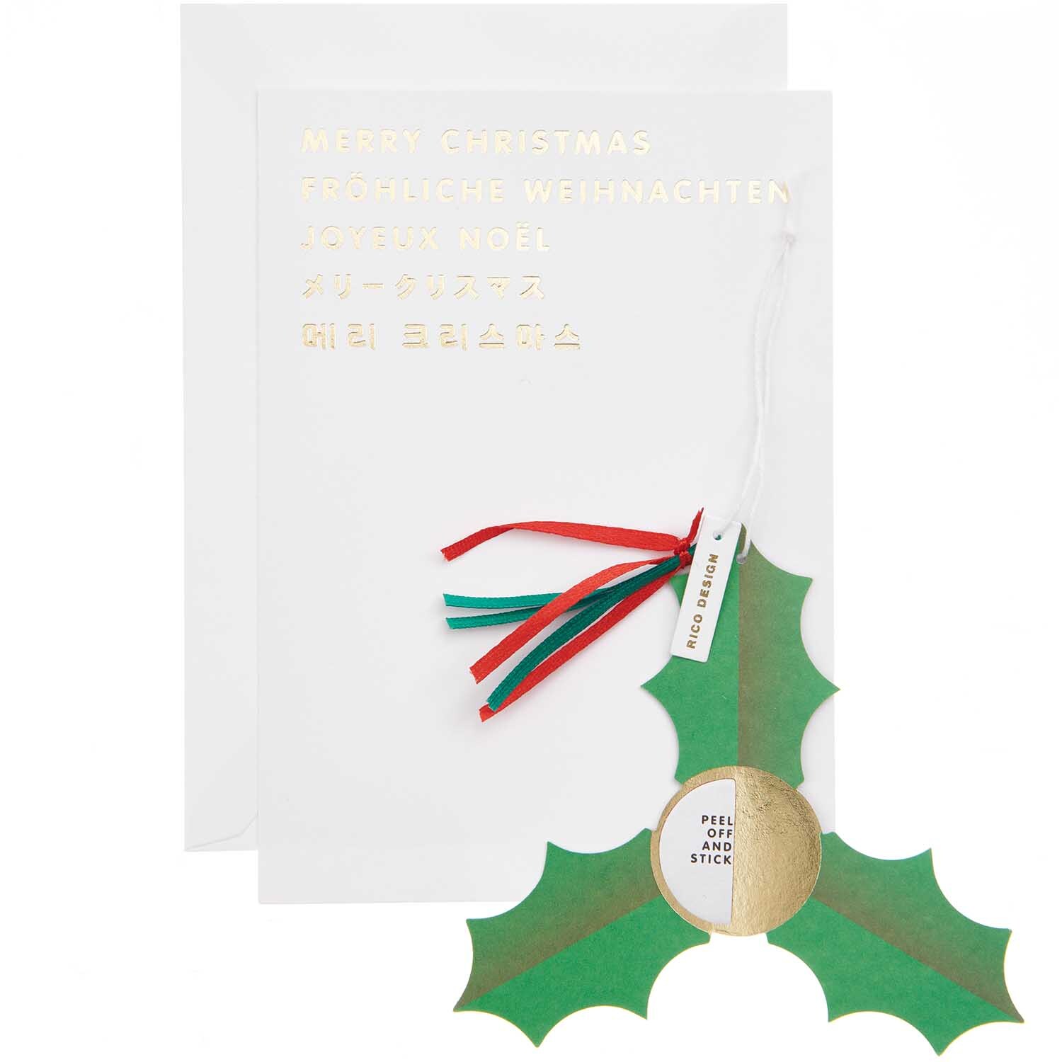 Paper Poetry Kartenset mit Pop-Up Anhänger Ilex B6 zeigt eine elegante Weihnachtskarte mit grünem Ilex-Anhänger und farbigen Bändern von Rico Design.