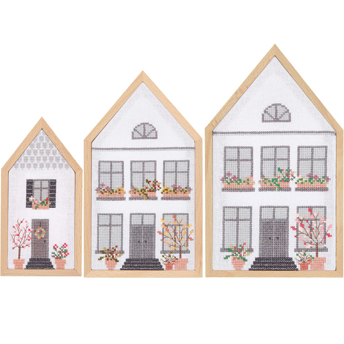 Cadre décoratif Maison format vertical set de 6 pièces 6-teilig from Rico Design Dekorahmen Haus Hochformat Set: Drei holzgerahmte Stickbilder in Hausform mit floralen Motiven.