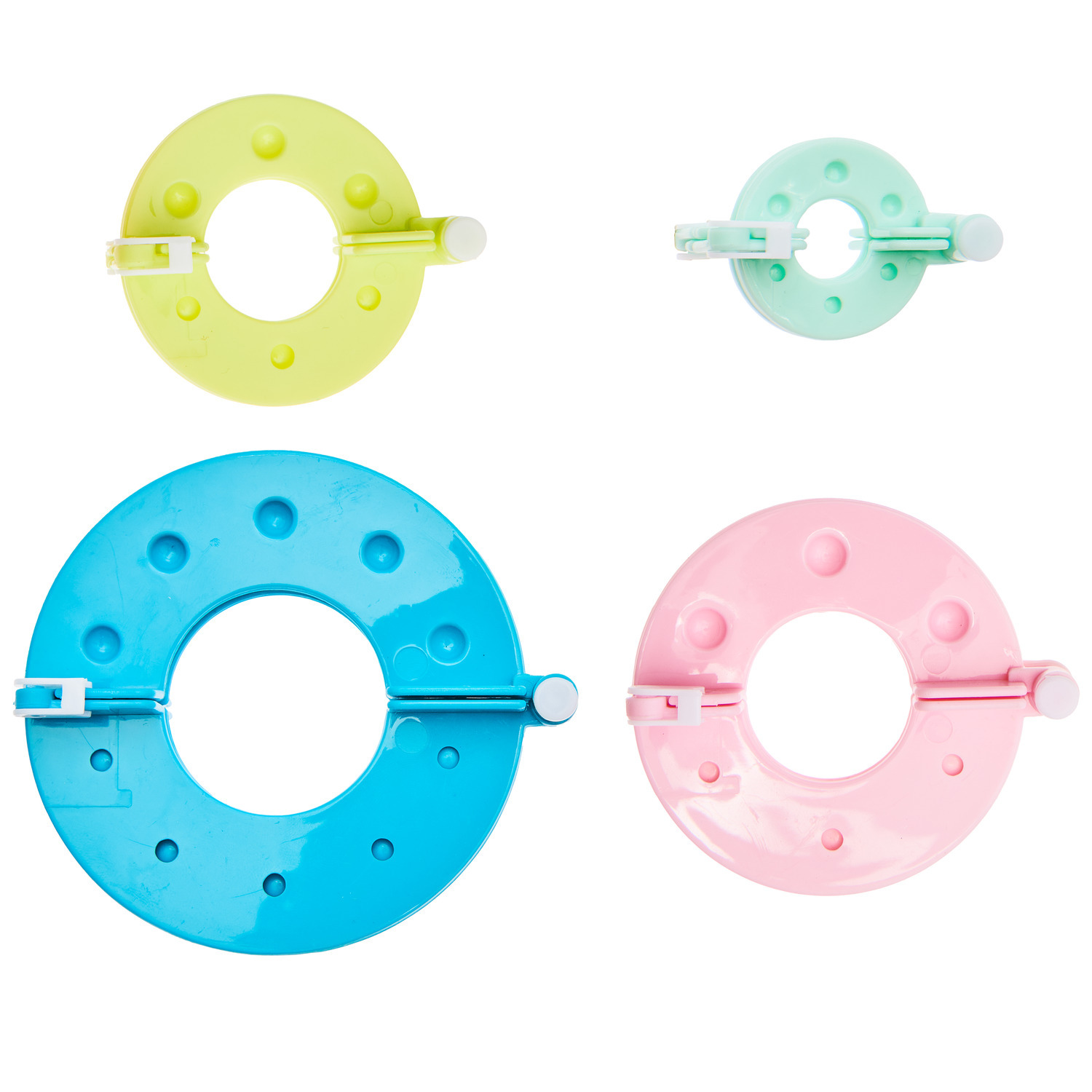 Pompon Maker 4er Set: Vier bunte Pompon-Maker in verschiedenen Größen von Rico Design.