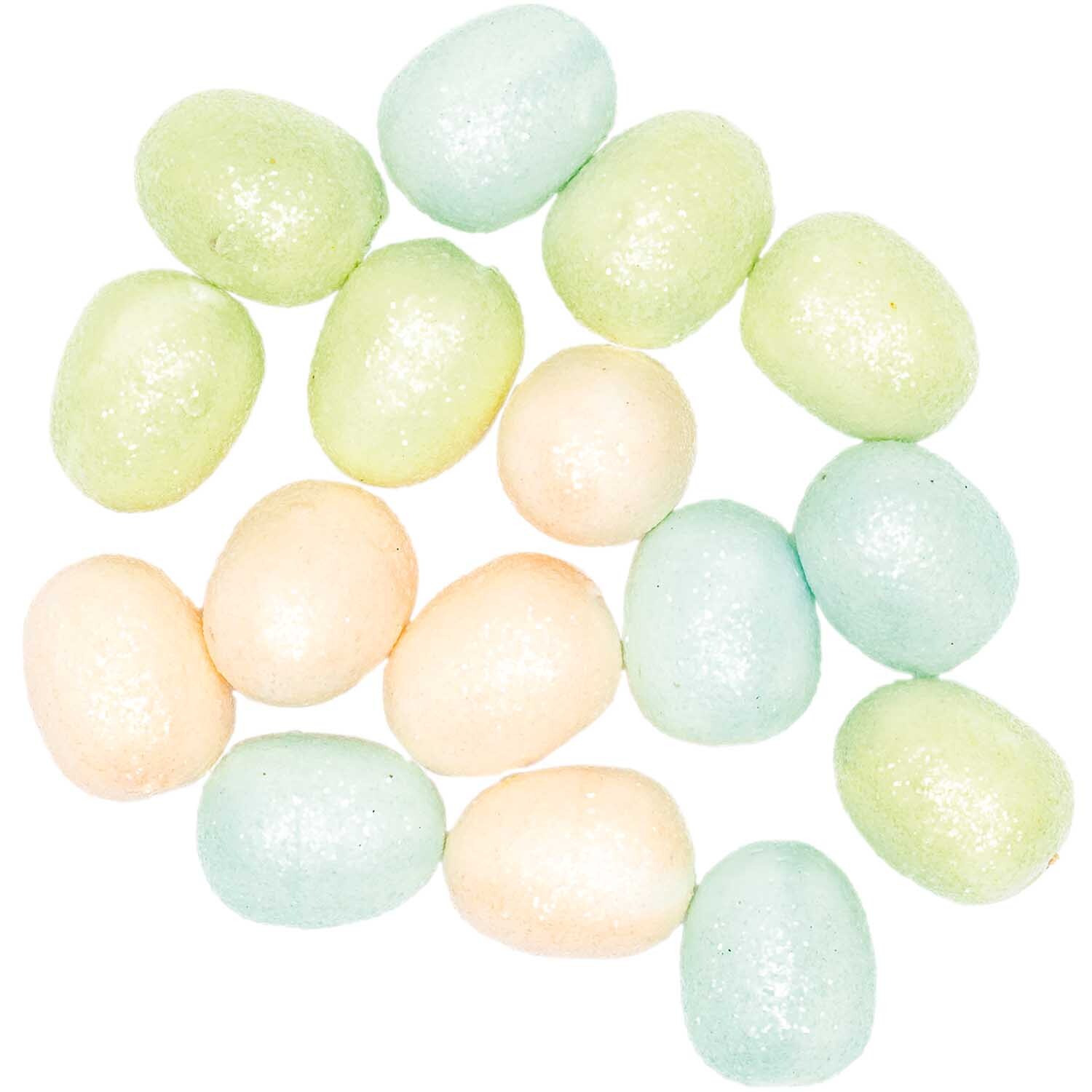 Glitter-Eier pastell 3cm 16 Stück von Rico Design in sanften Pastelltönen, ideal für Dekorationen.