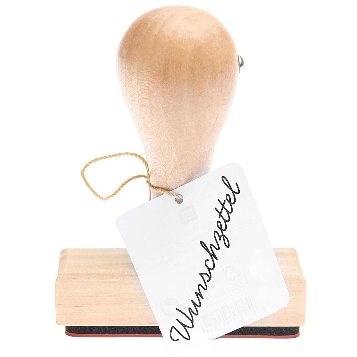 Paper Poetry Stempel Wunschzettel 6,5x2cm von Rico Design zeigt einen Holzgriff mit Wunschzettel-Etikett. Ideal für kreative Projekte.