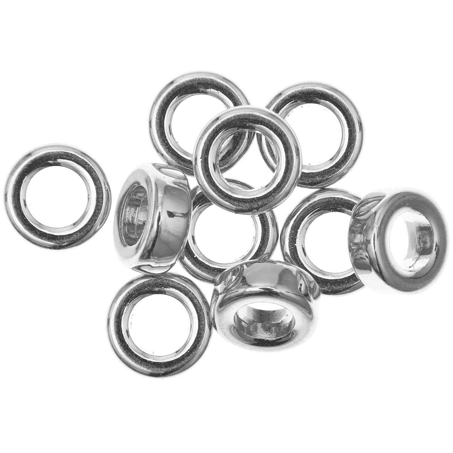 itoshii - Ponii Beads Ringe 9x3,5mm 10 Stück Farbe Silber von Rico Design itoshii - Ponii Beads Ringe in Silber von Rico Design, 9x3,5mm, 10 Stück. Zehn glänzende, silberne Ringe in Nahaufnahme.