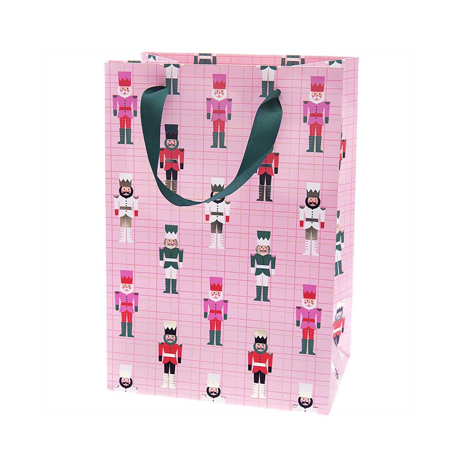 Paper Poetry Geschenktüte mit Nussknacker-Muster, rosa, von Rico Design. Ideal für festliche Anlässe.