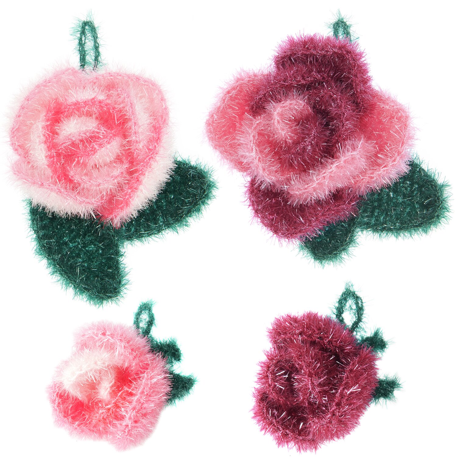 Häkelset Creative Bubble Rose Classic: Flauschige, gehäkelte Rosen in Rosa- und Rottönen mit grünen Blättern von Rico Design.