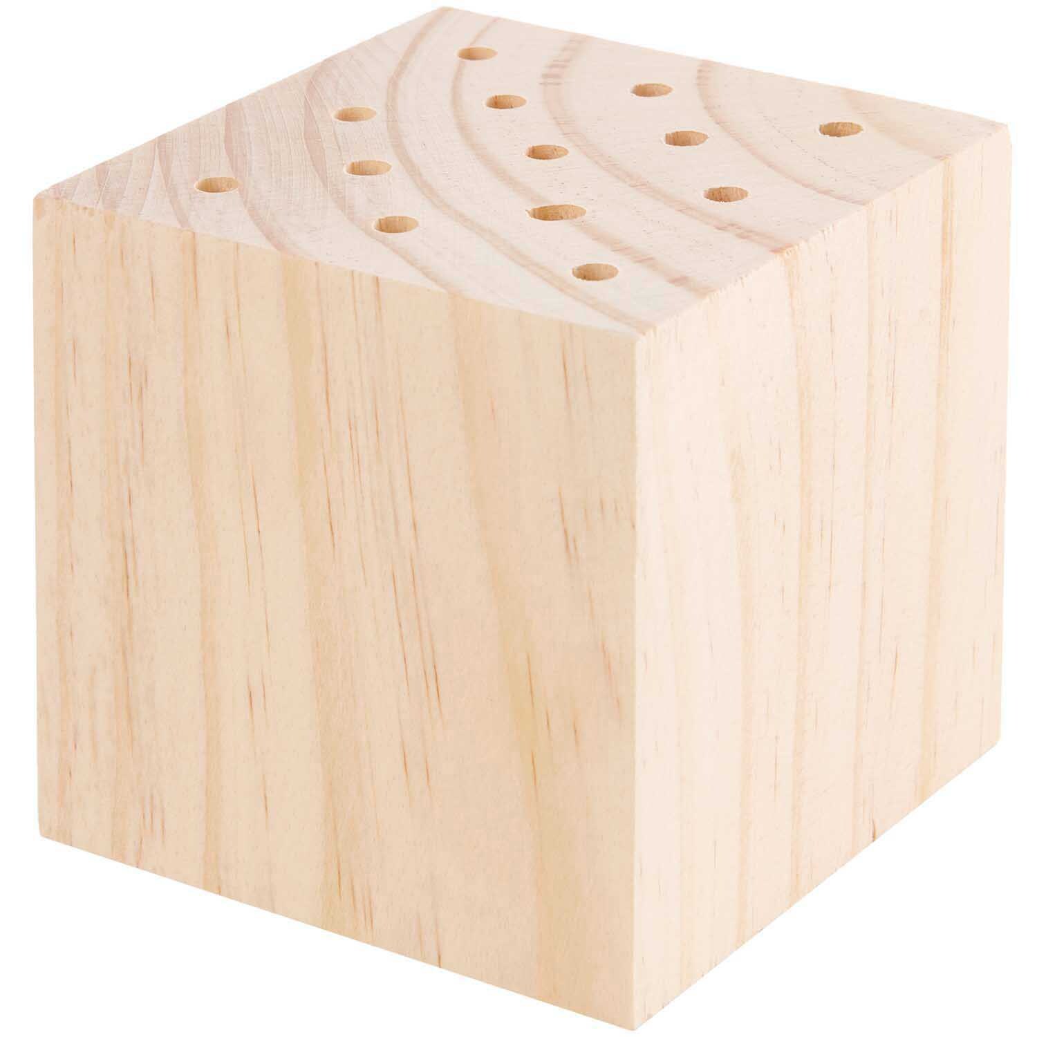 Holzständer für Trockenblumen 8x8x8cm Farbe Natur von Rico Design Holzständer für Trockenblumen 8x8x8cm von Rico Design. Würfelförmiger Ständer mit Löchern, ideal für kreative Dekorationen.
