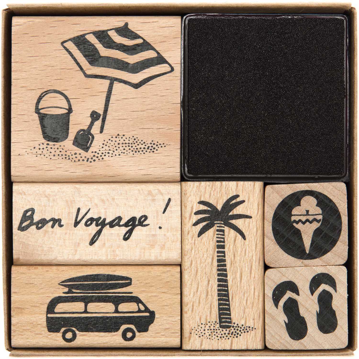 Paper Poetry Stempelset Bon Voyage, 7-teilig, mit Strandmotiven und schwarzem Stempelkissen. Ideal für kreative Projekte und Scrapbooking.
