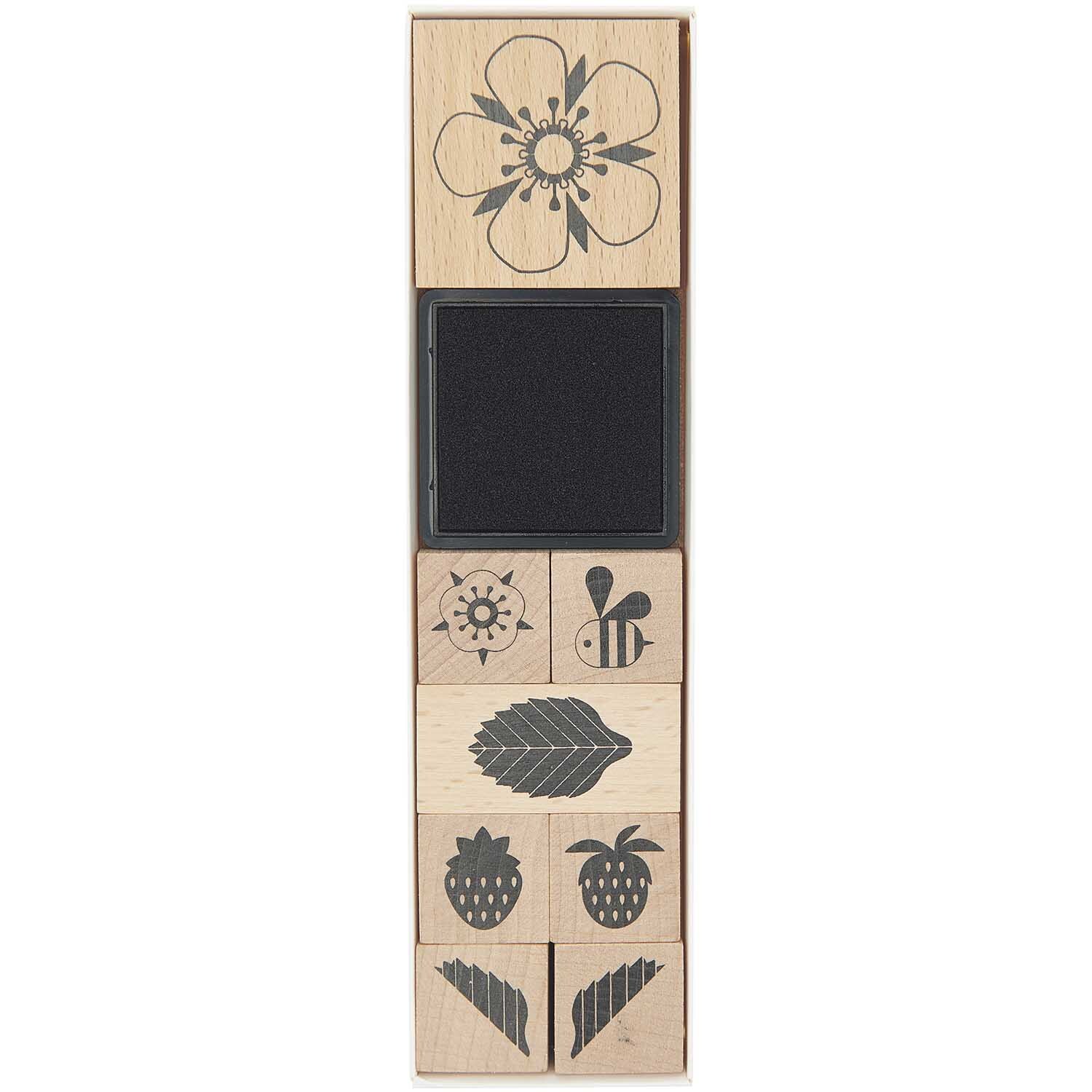 Paper Poetry Stempelset mit Blumen-, Bienen- und Fruchtmotiven von Rico Design, 9-teilig.