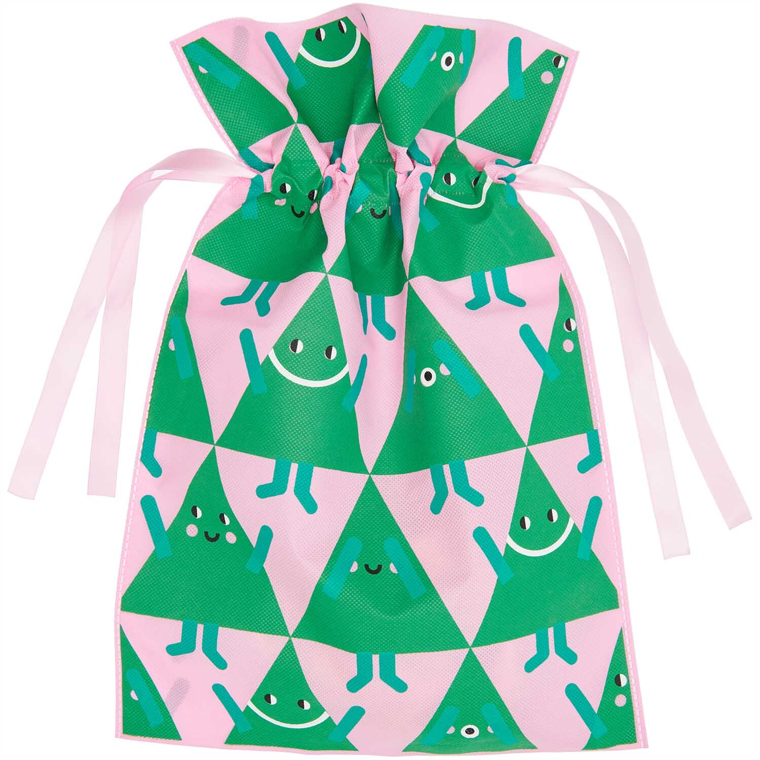 Geschenktüte Tannen groß 30x45cm mit fröhlichen grünen Tannenbaum-Motiven auf rosa Hintergrund, von Rico Design.