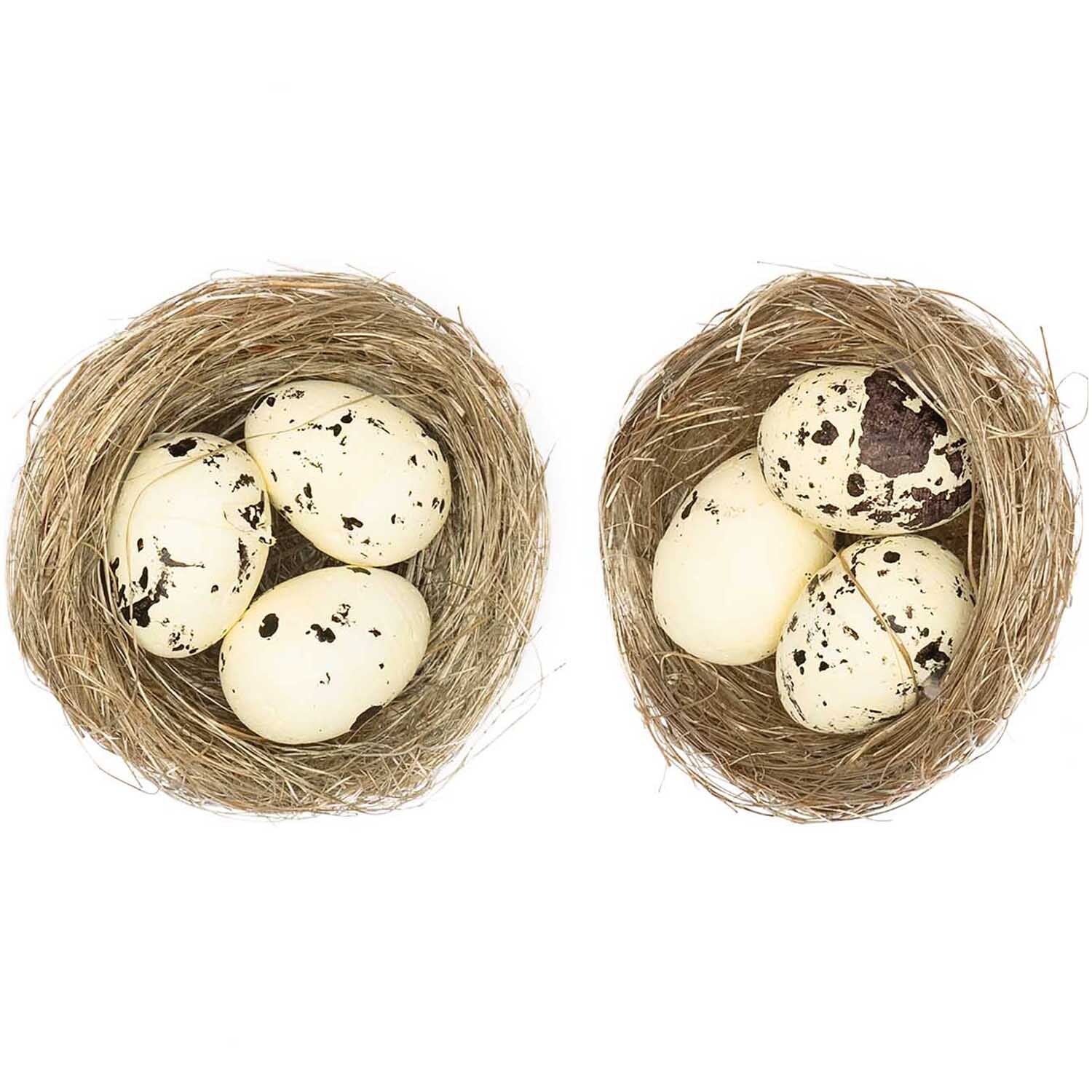 Naturnest mit Eiern creme 6,5cm 2 Stück von Rico Design zeigt zwei Nester mit gesprenkelten Eiern.
