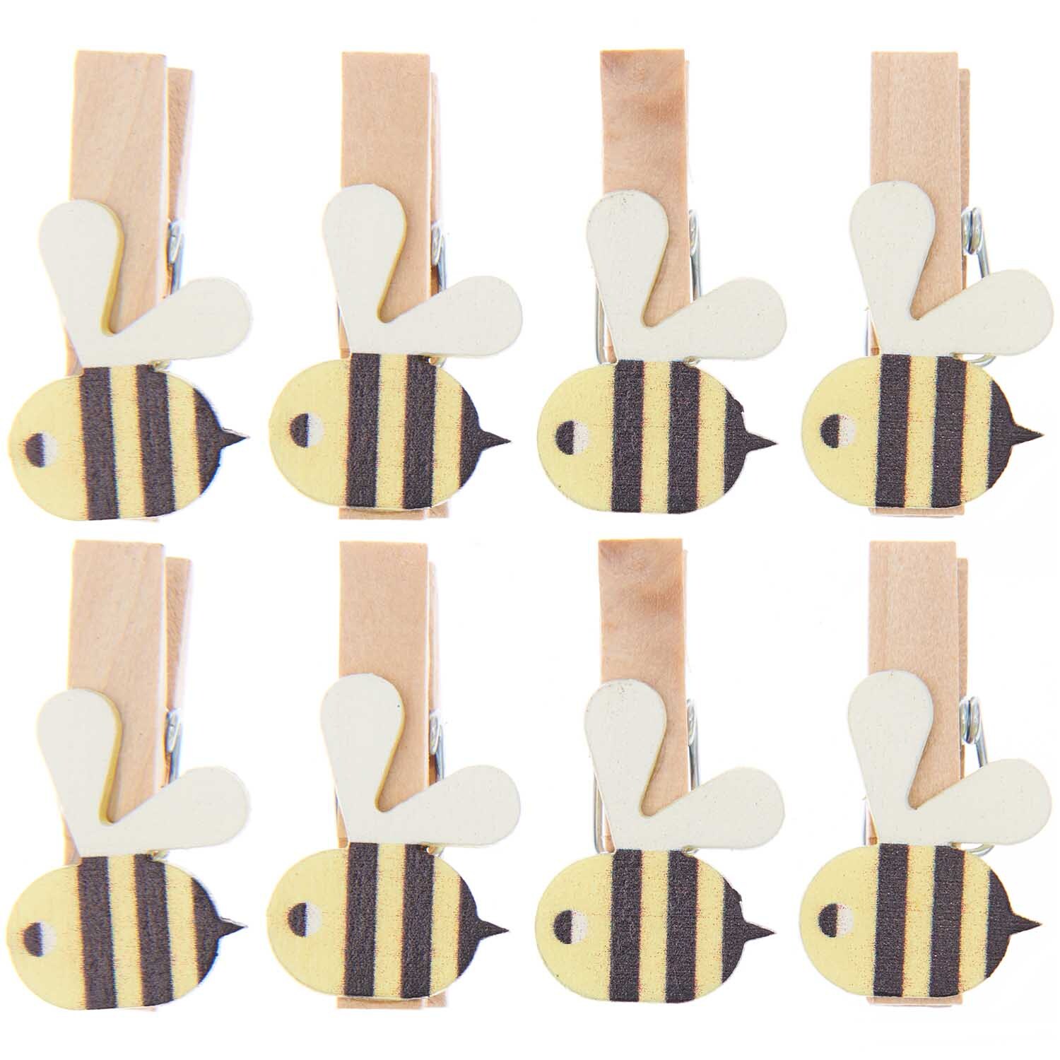 Holzklammern Biene: Acht Holzklammern mit niedlichen Bienenmotiven von Rico Design, ideal für kreative Projekte.