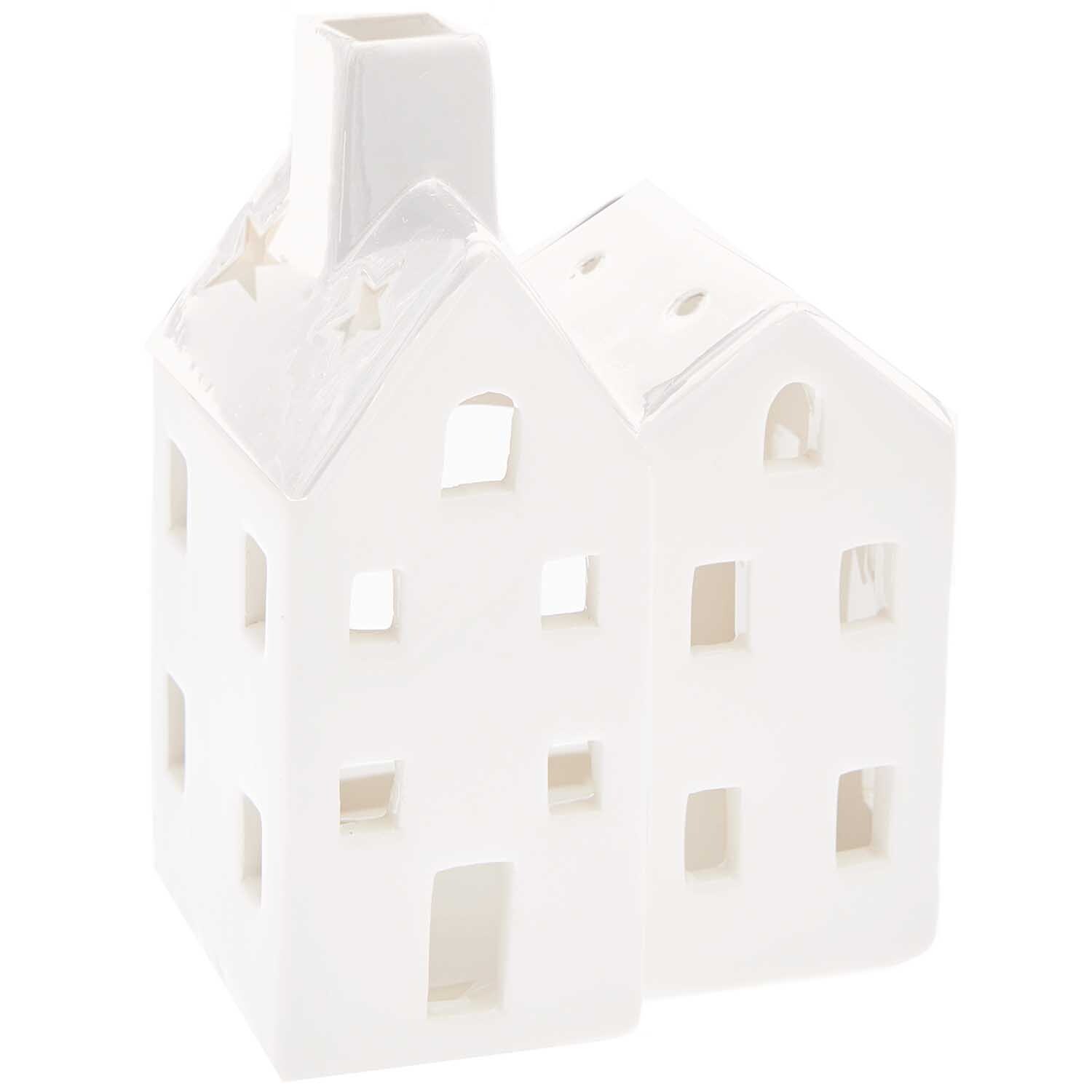 Keramik-Kerzenhalter Haus in Form eines weißen Gebäudes mit Fenstern und Schornstein. Ideal für stimmungsvolle Dekoration. Marke: Rico Design.