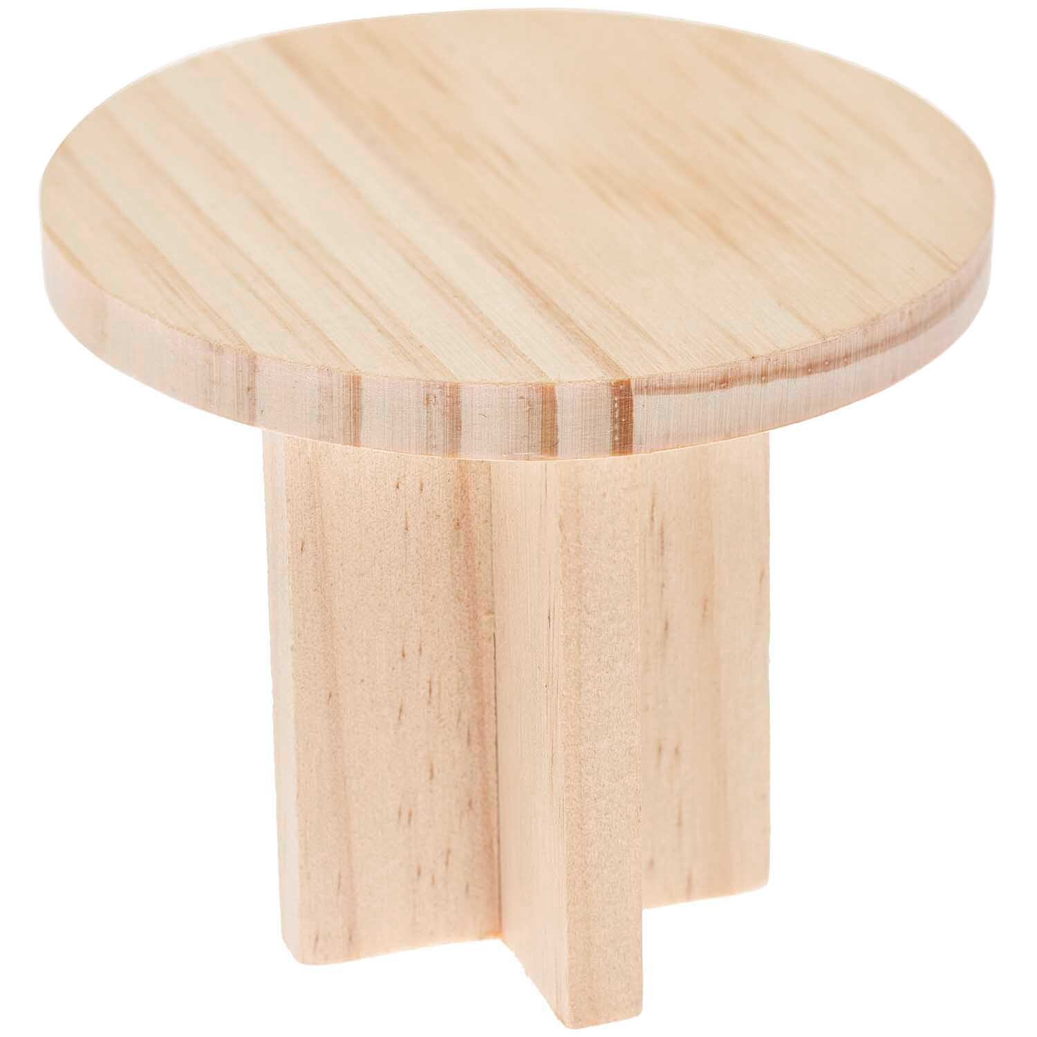Miniatur Tisch rund 8x8x6,5cm von Rico Design Miniatur Tisch rund aus hellem Holz mit glatter Oberfläche, ideal für Modellbauprojekte. Maße: 8x8x6,5cm.