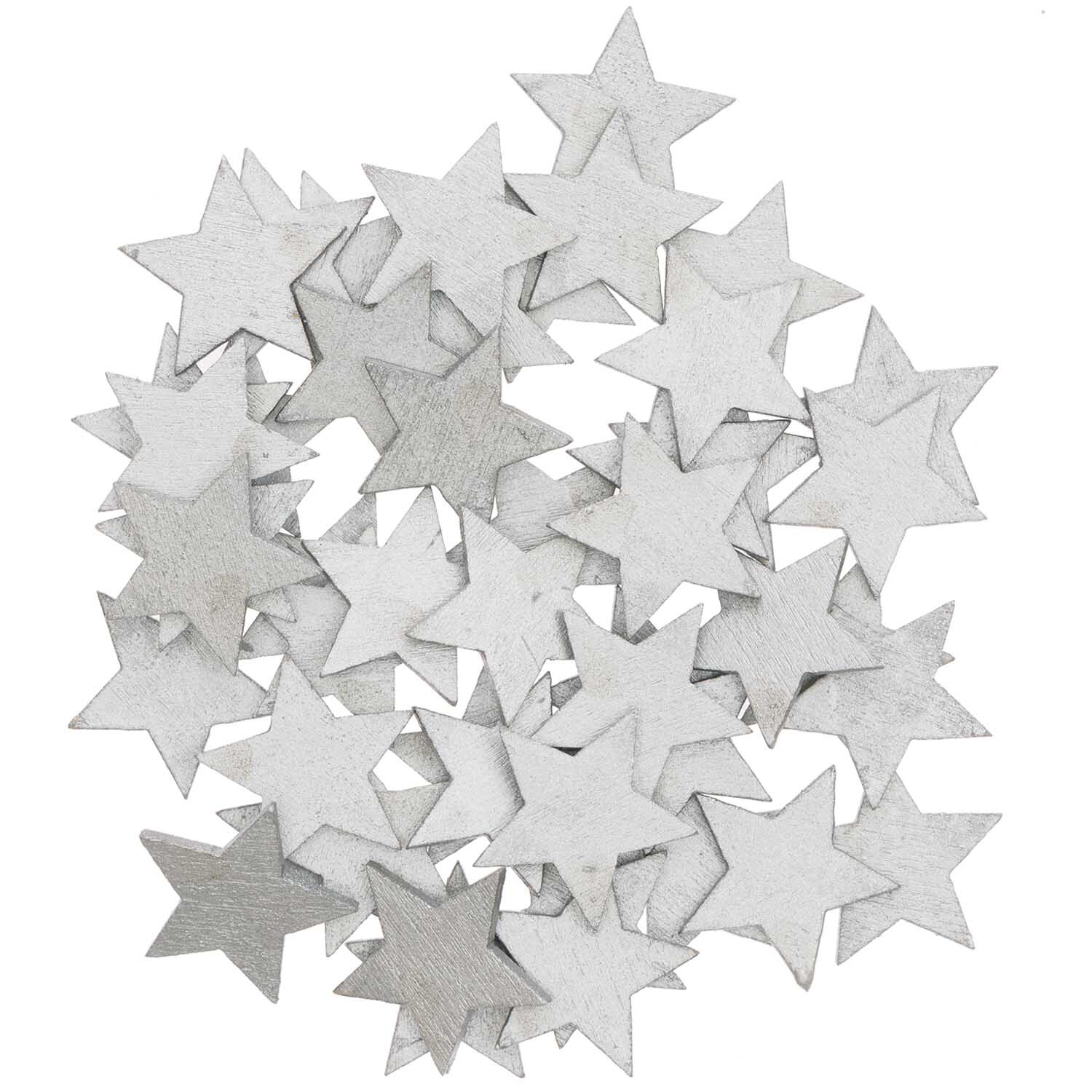 Holzstreu Stern 20x19mm 48 Stück Farbe Silber von Rico Design Holzstreu Stern 20x19mm 48 Stück von Rico Design in Silber, dekorative Holzsterne für kreative Projekte.