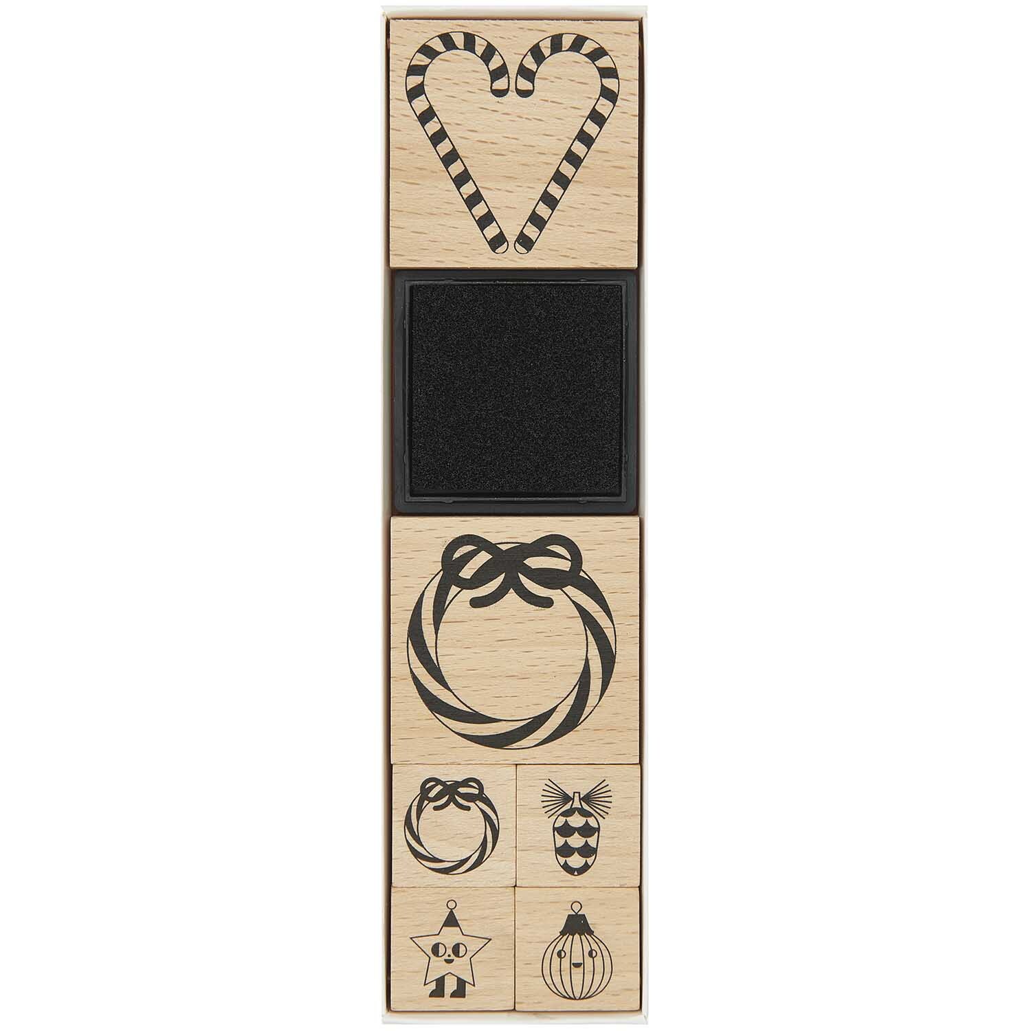 Paper Poetry Stempelset Candy Cane: Sieben Holzstempel mit weihnachtlichen Motiven von Rico Design.